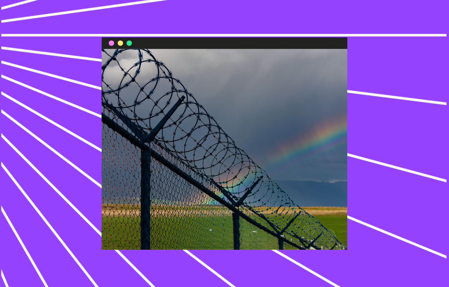 Barbed wired with rainbow flag in a dark clouded sky.