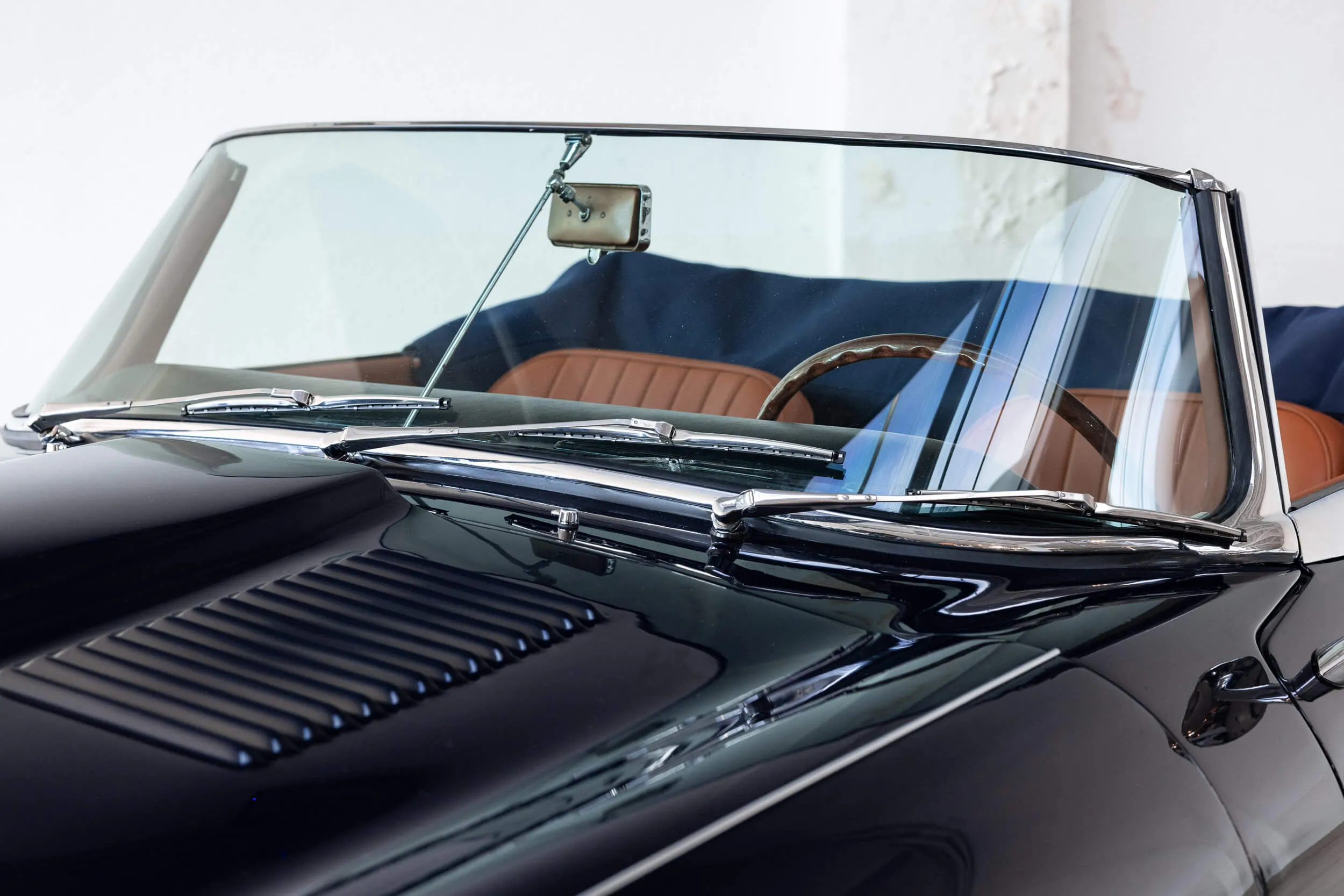windshield view of Jaguar E-Type Series 1 OTS 1967 Dark Blue