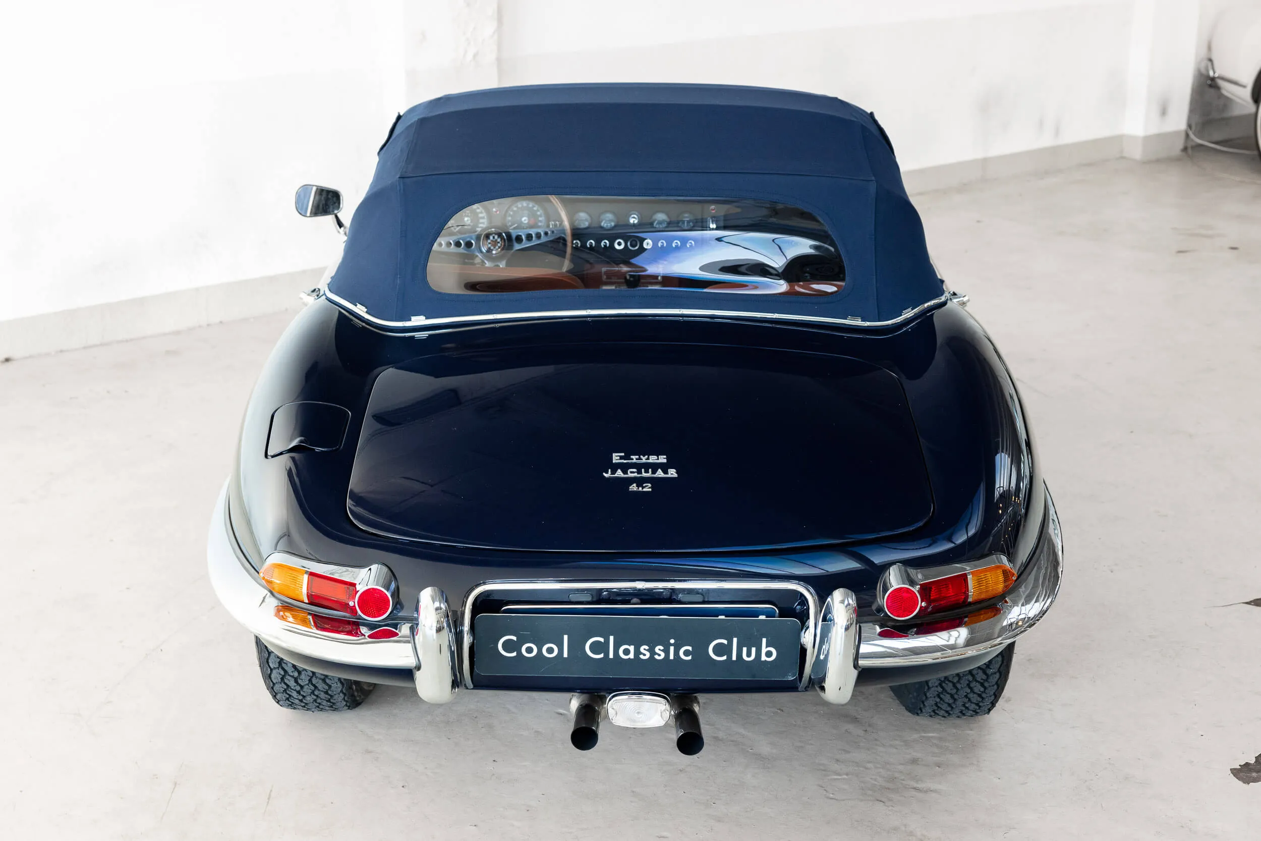 Rear view higher position of Jaguar E-Type Series 1 OTS 1967 Dark Blue