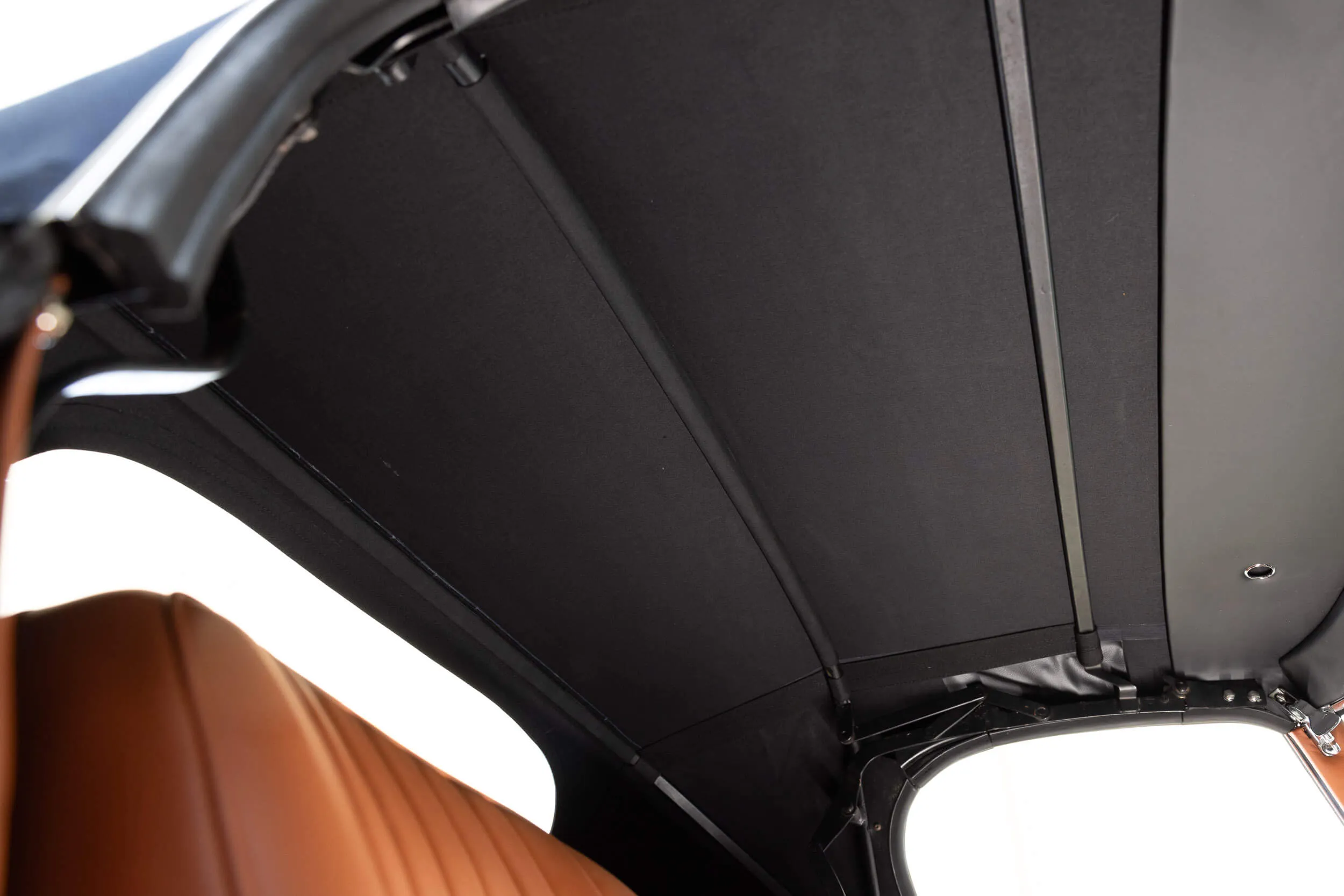 Inside soft top view of Jaguar E-Type Series 1 OTS 1967 Dark Blue