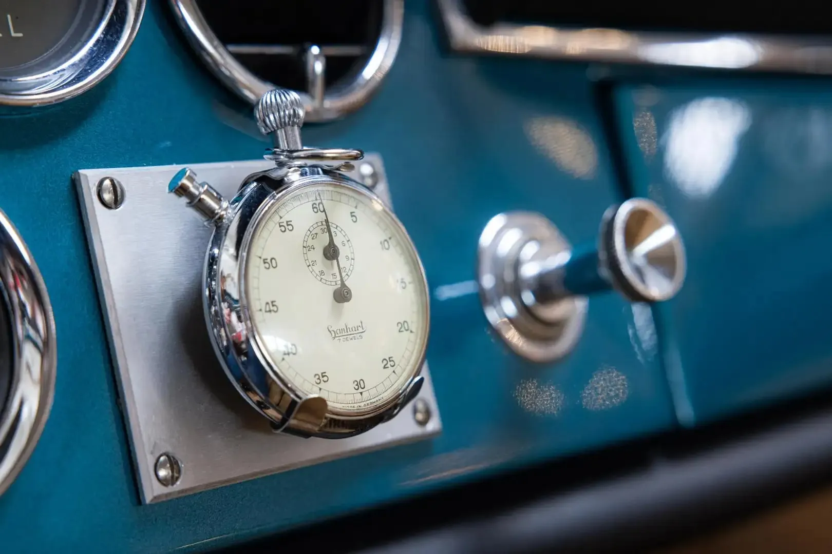 Ferrari 250 GTE interior detail: a racing stopwatch mounted on the dashboard