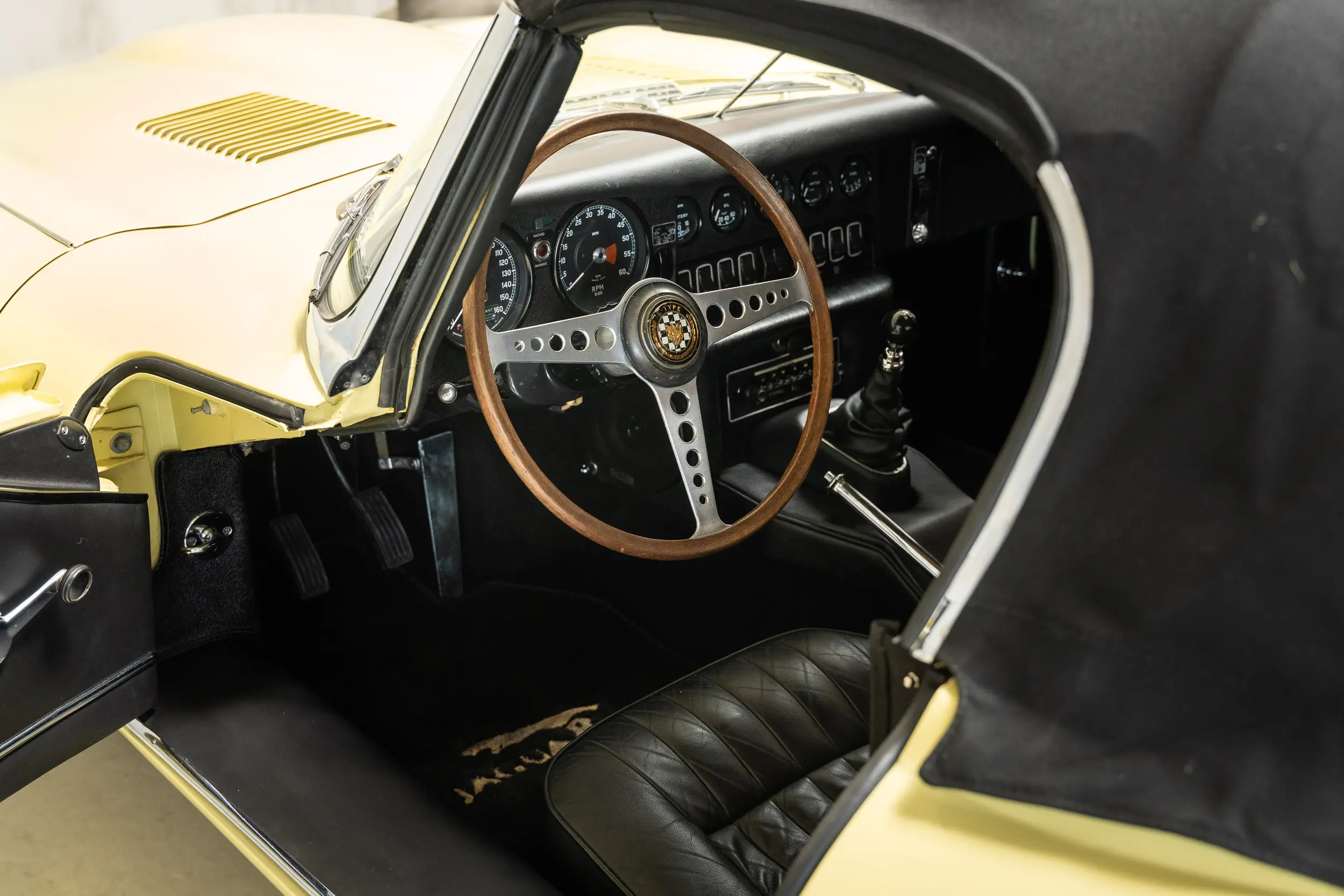 Overview of driver's seat Oblique view of an Jaguar E Type OTS 