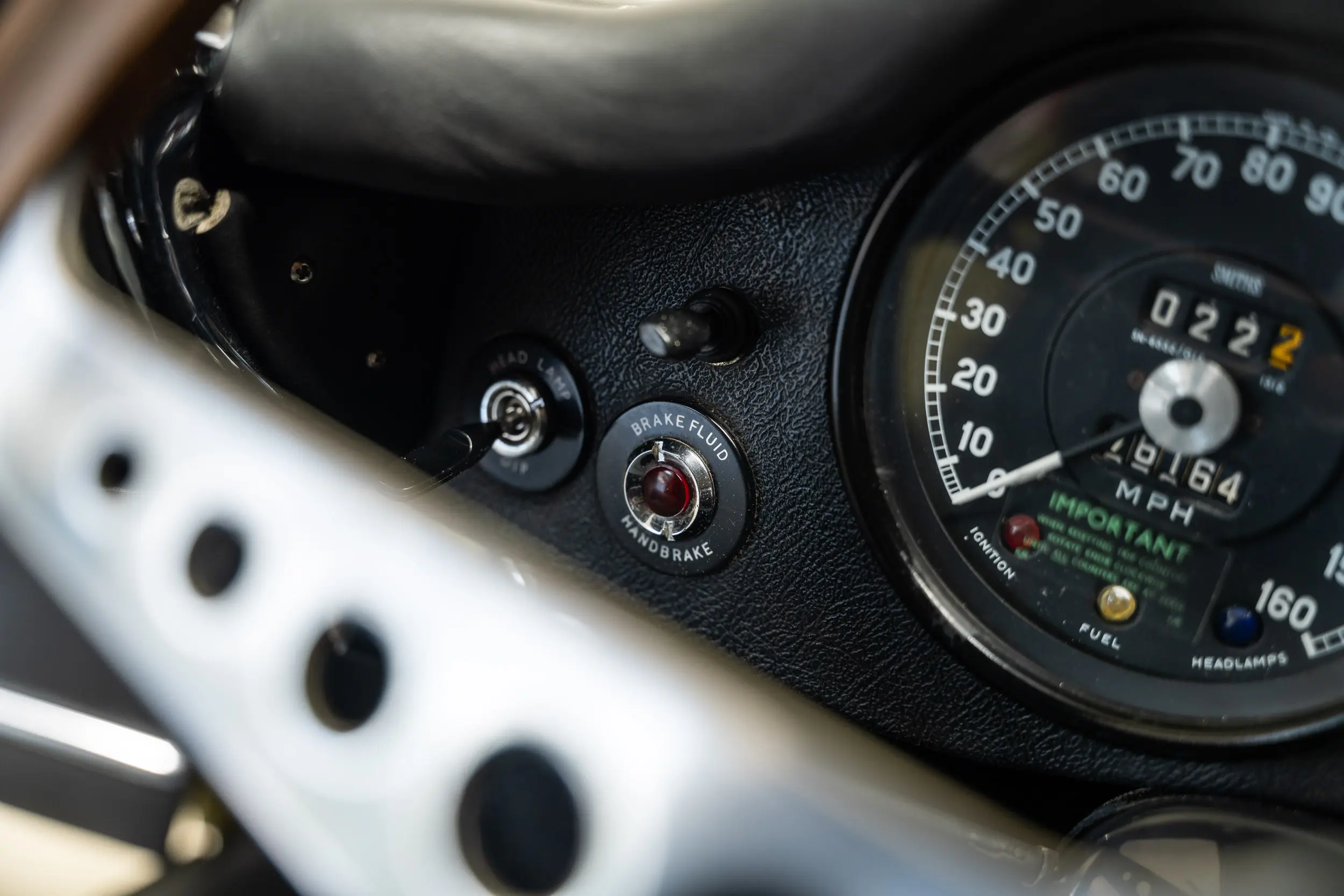 View of warning light on dashboard Oblique view of an Jaguar E Type OTS 