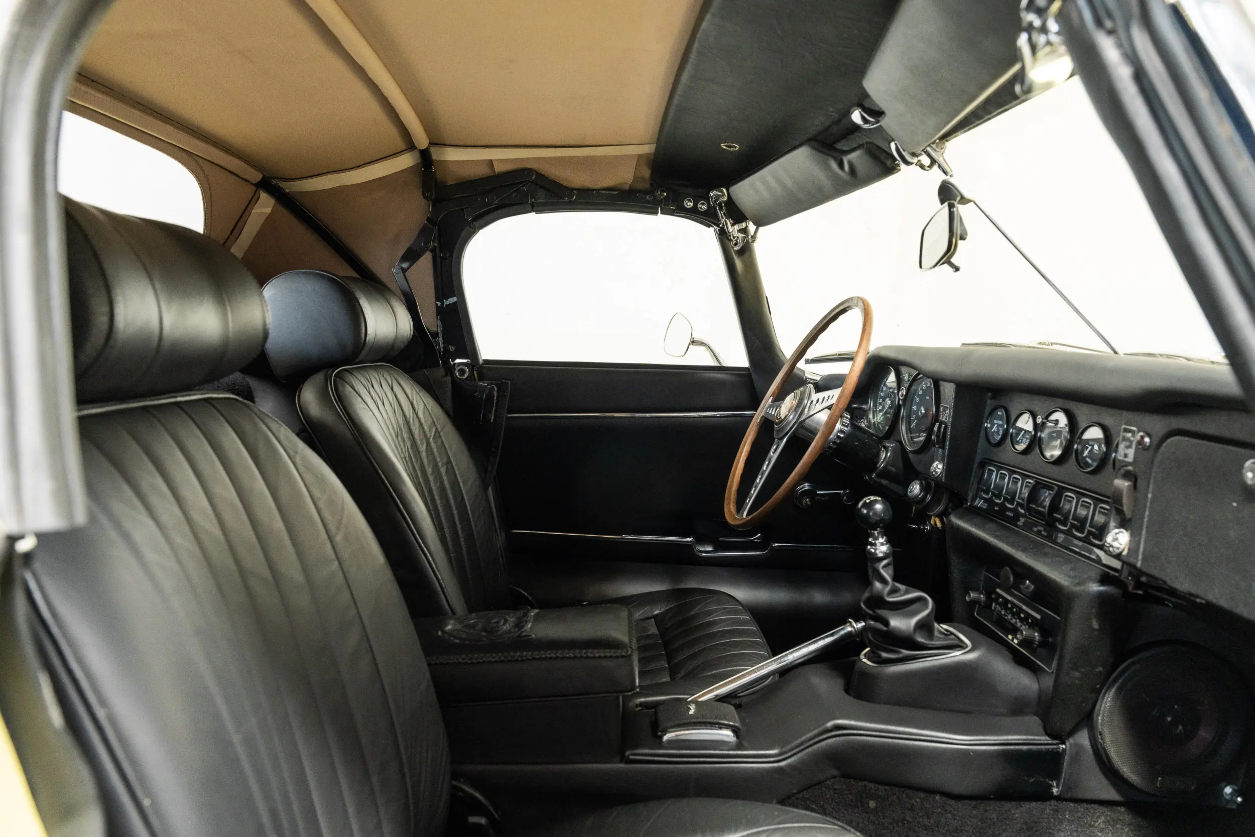 overview of interior Oblique view with top up of an Jaguar E Type OTS 