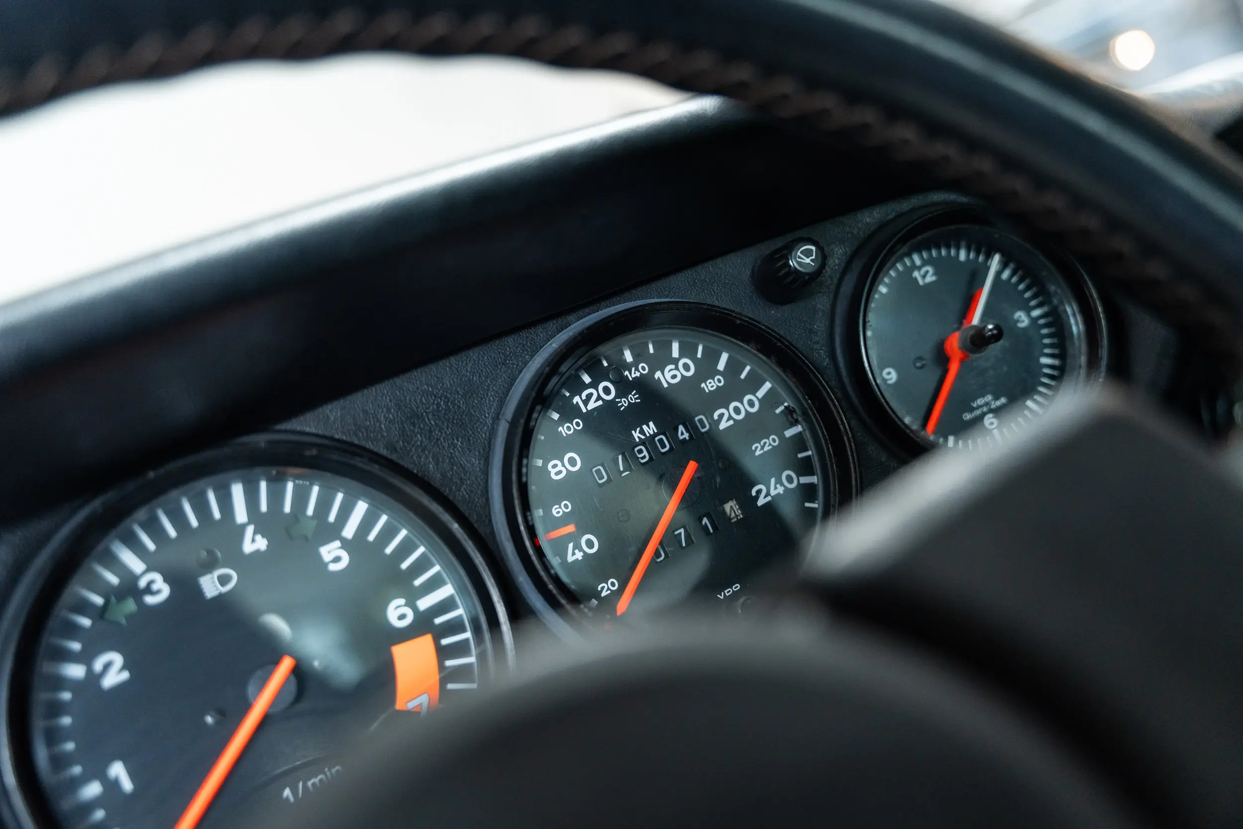 detailed view of dials on dashboard of an Porsche 911 3.0 SC Targa