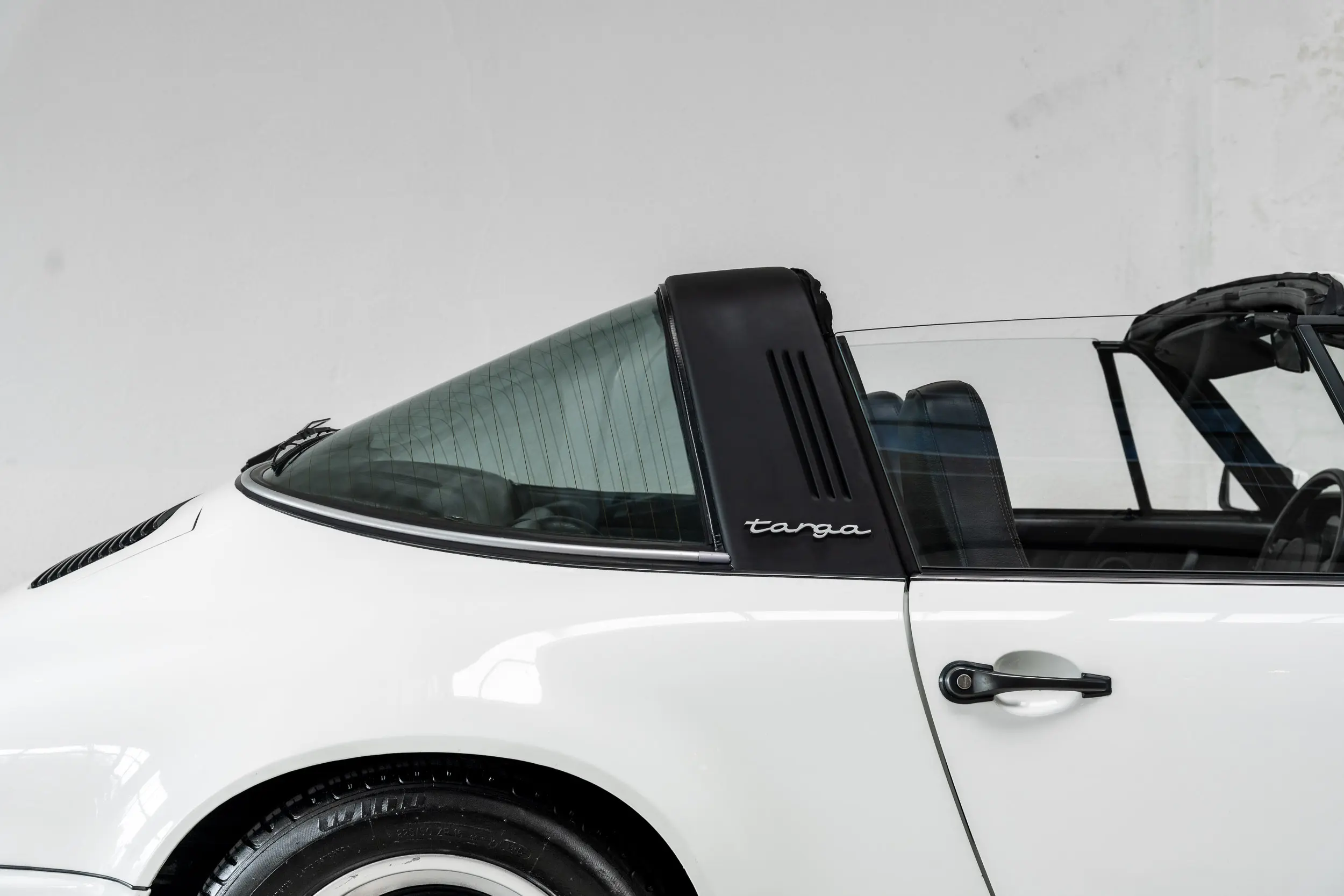 side view with roof down of an Porsche 911 3.0 SC Targa