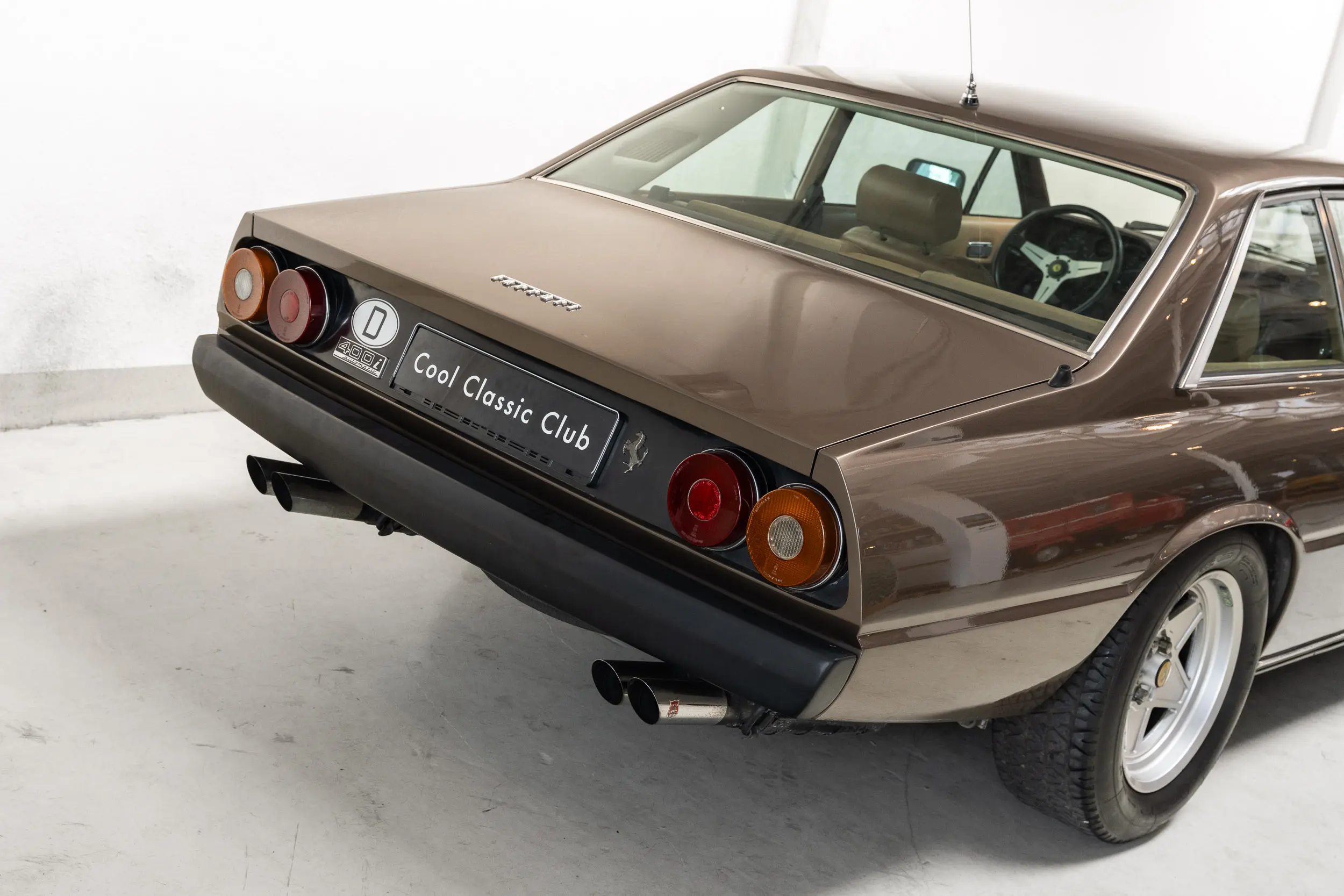 Oblique rear overview of an Ferrari 400 i