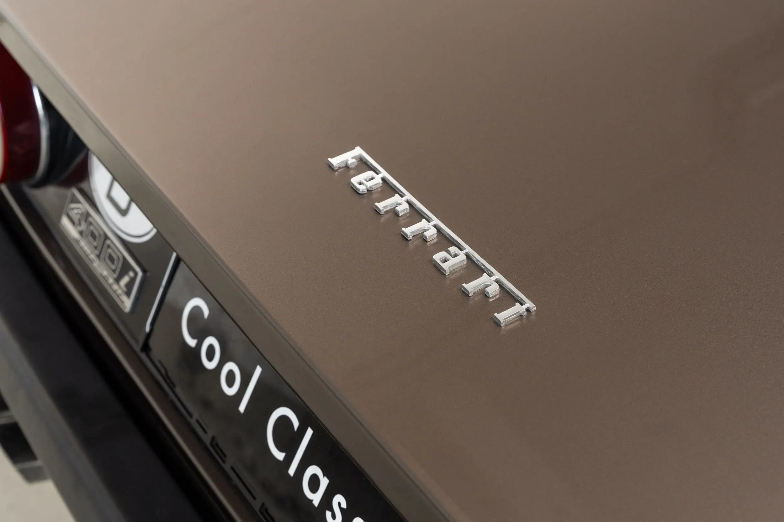 View of Ferrari badge on rear of an Ferrari 400 i