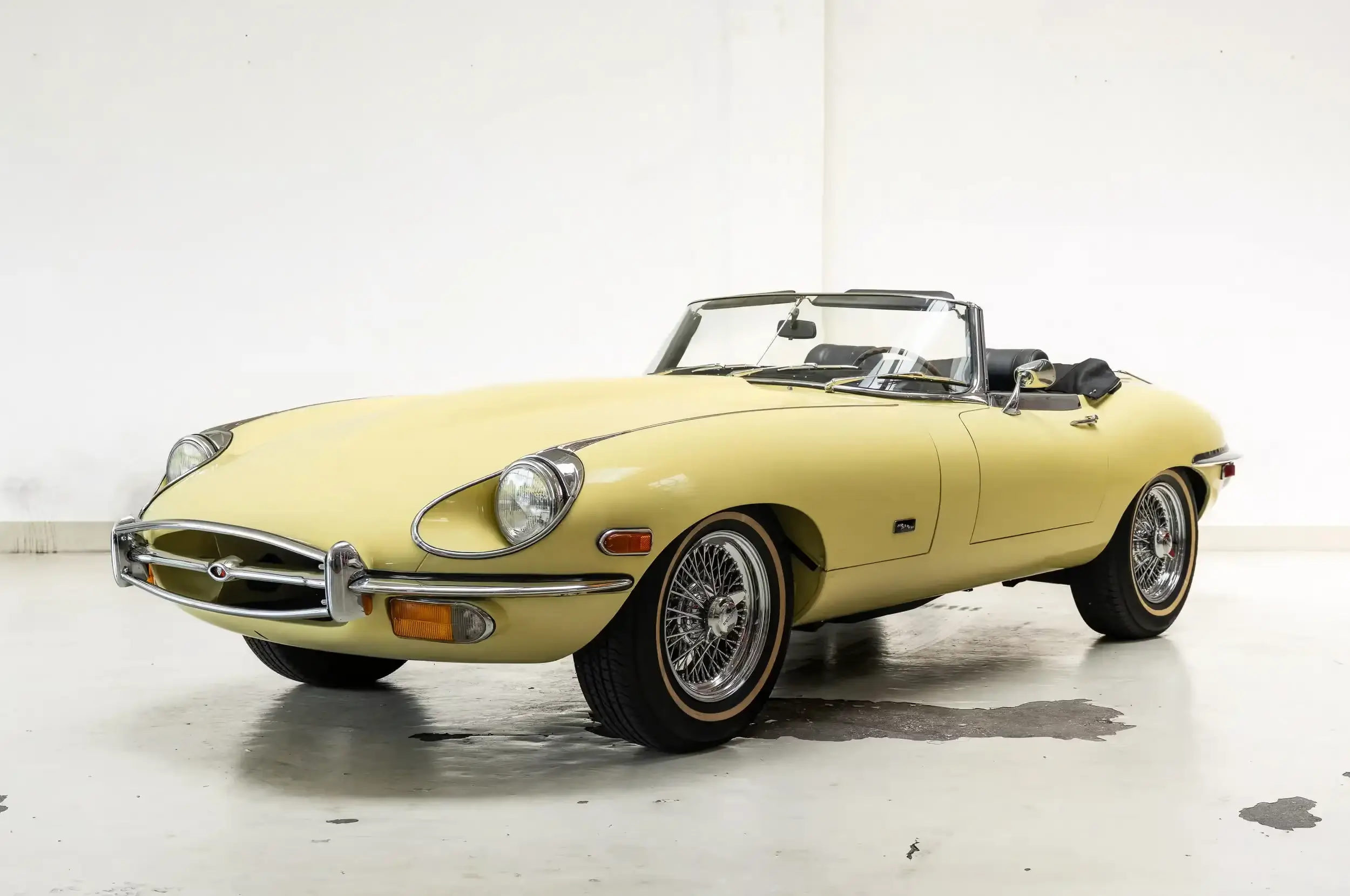 Front oblique view of the 1969 Pale Primrose Yellow Jaguar E-Type 4.2 OTS