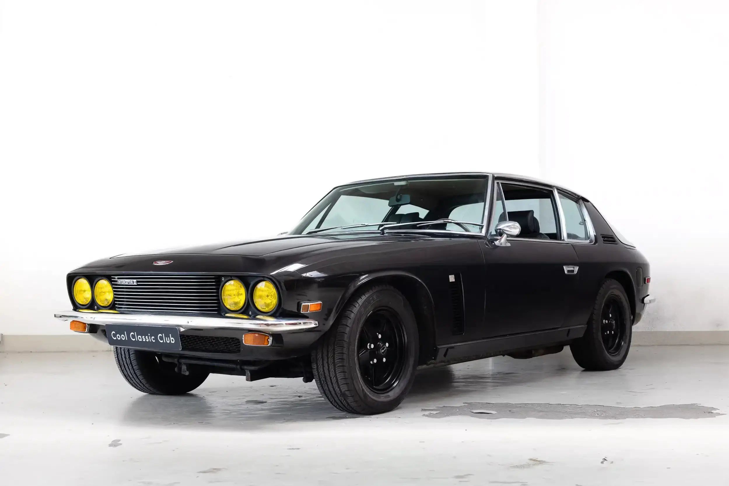 Front oblique view of the 1973 Beluga Black Jensen Interceptor