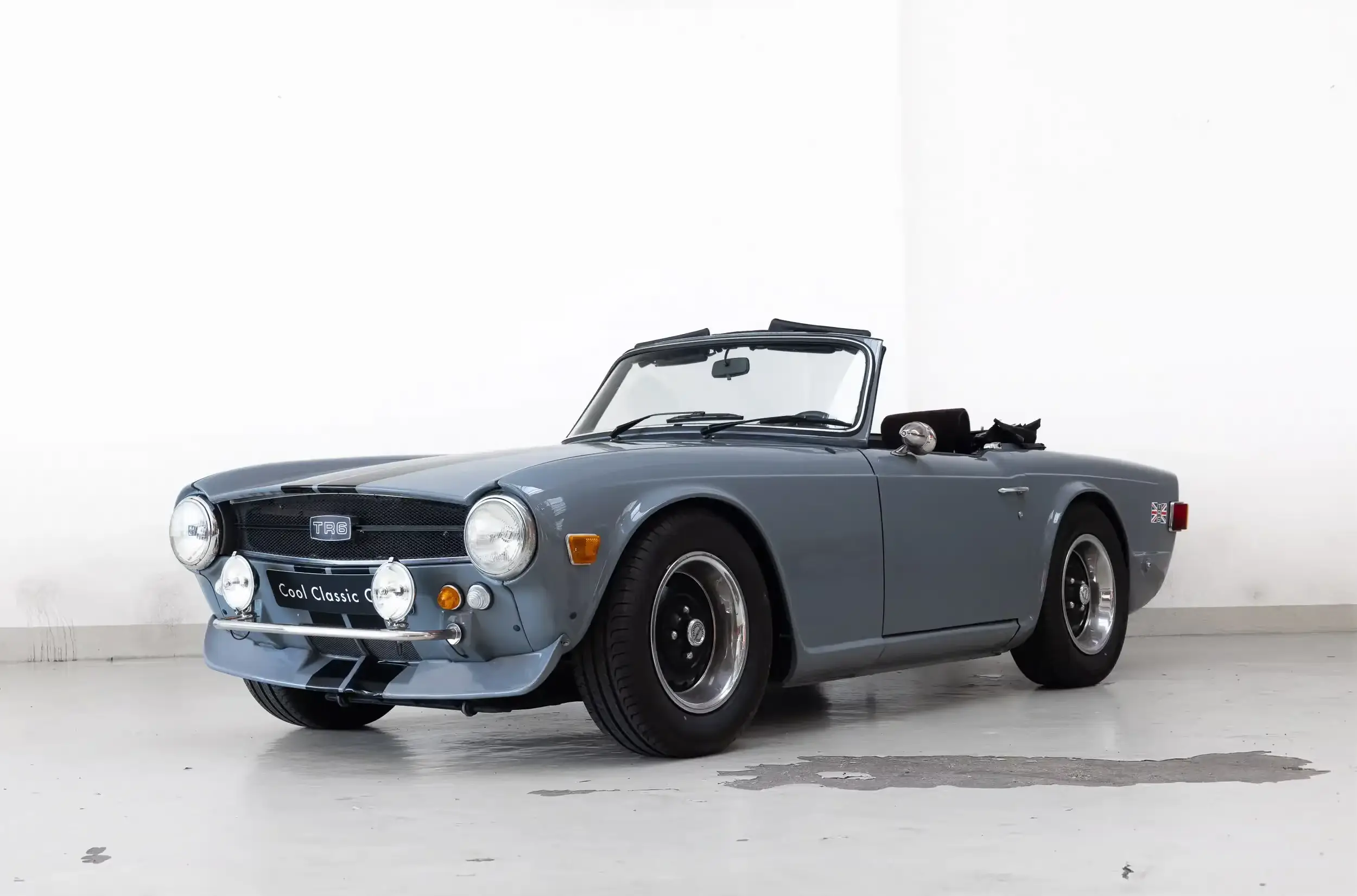 Front oblique view of the 1975 Nardo Gray  Triumph TR6