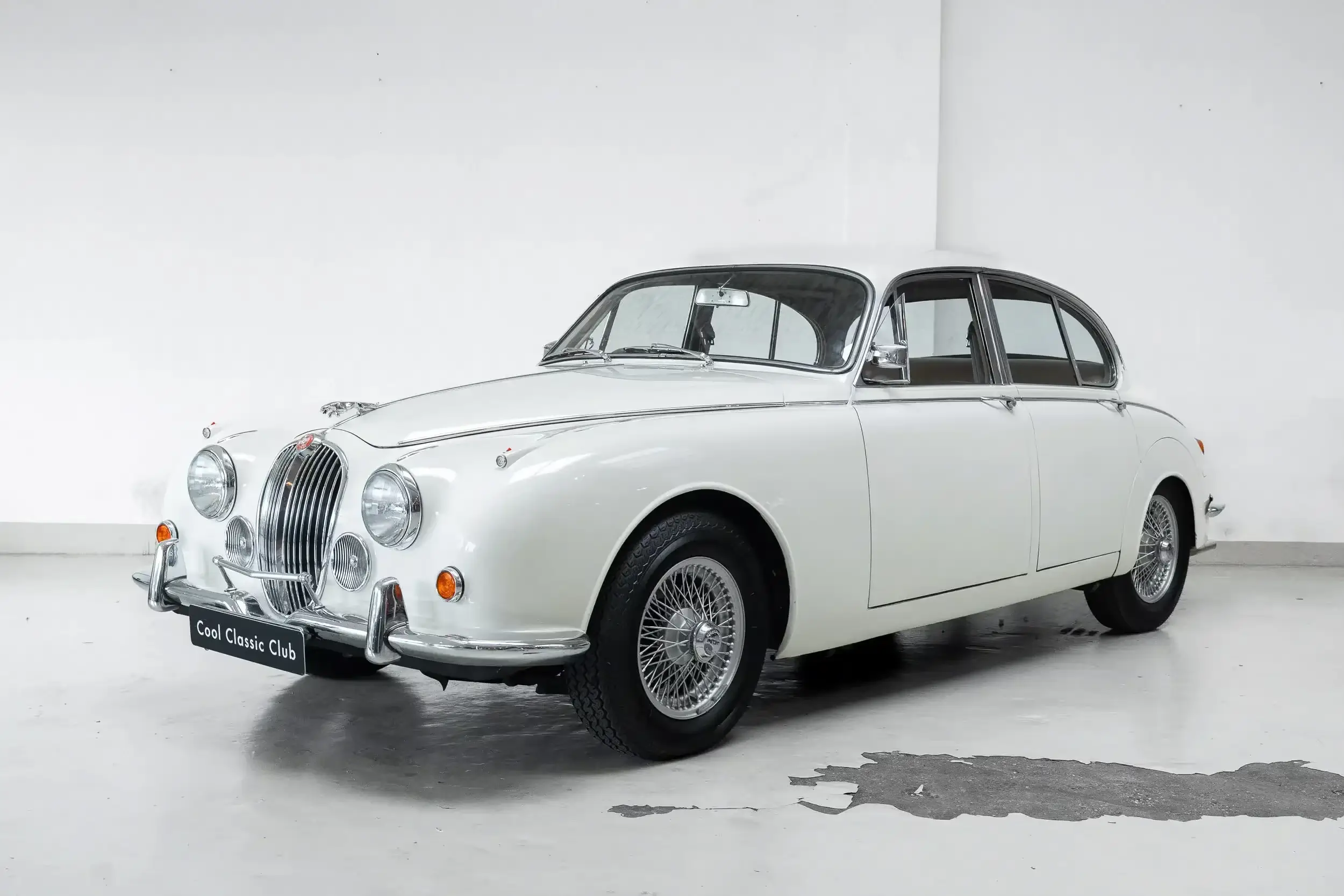 Front oblique view of the 1968 White Jaguar 340