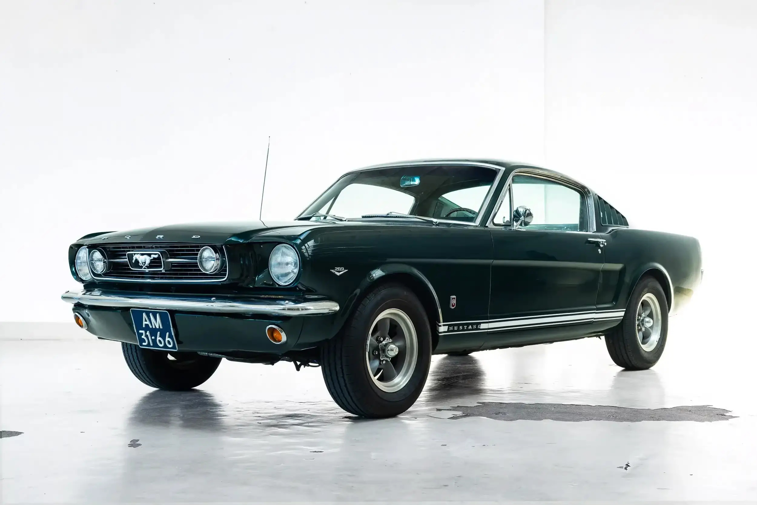Front oblique view of the 1966 Ivy Green Metallic Ford Mustang GT Fastback 