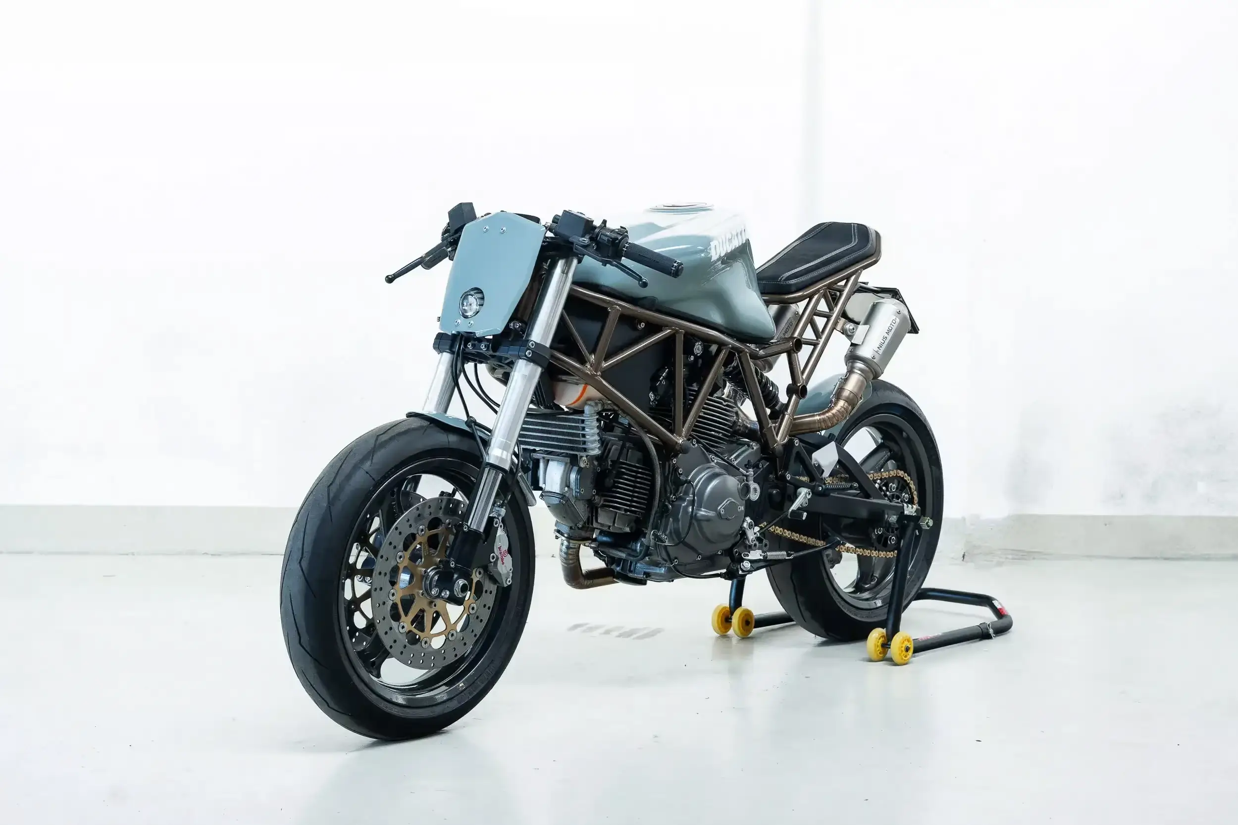 Front oblique view of the 2002 Porsche Shade Grey Ducati Sport 750 SS Custom