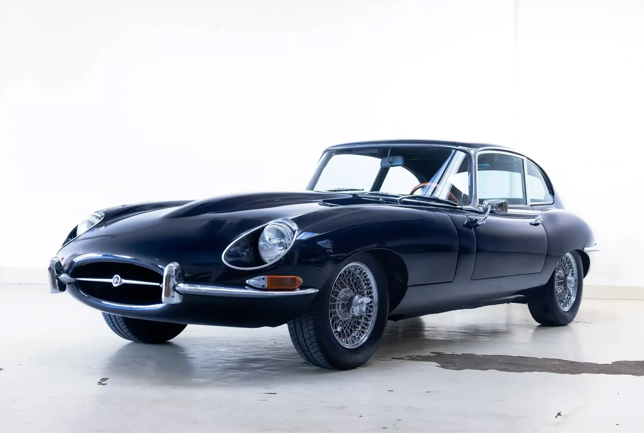 Front oblique view of the 1967 Dark Blue Jaguar E-Type 2+2 FHC 