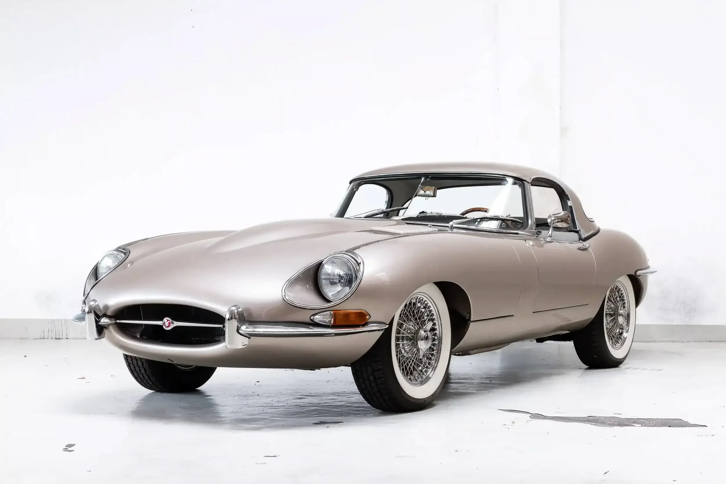 Front oblique view of the 1968 Golden Sand Jaguar E-Type 4.2 OTS