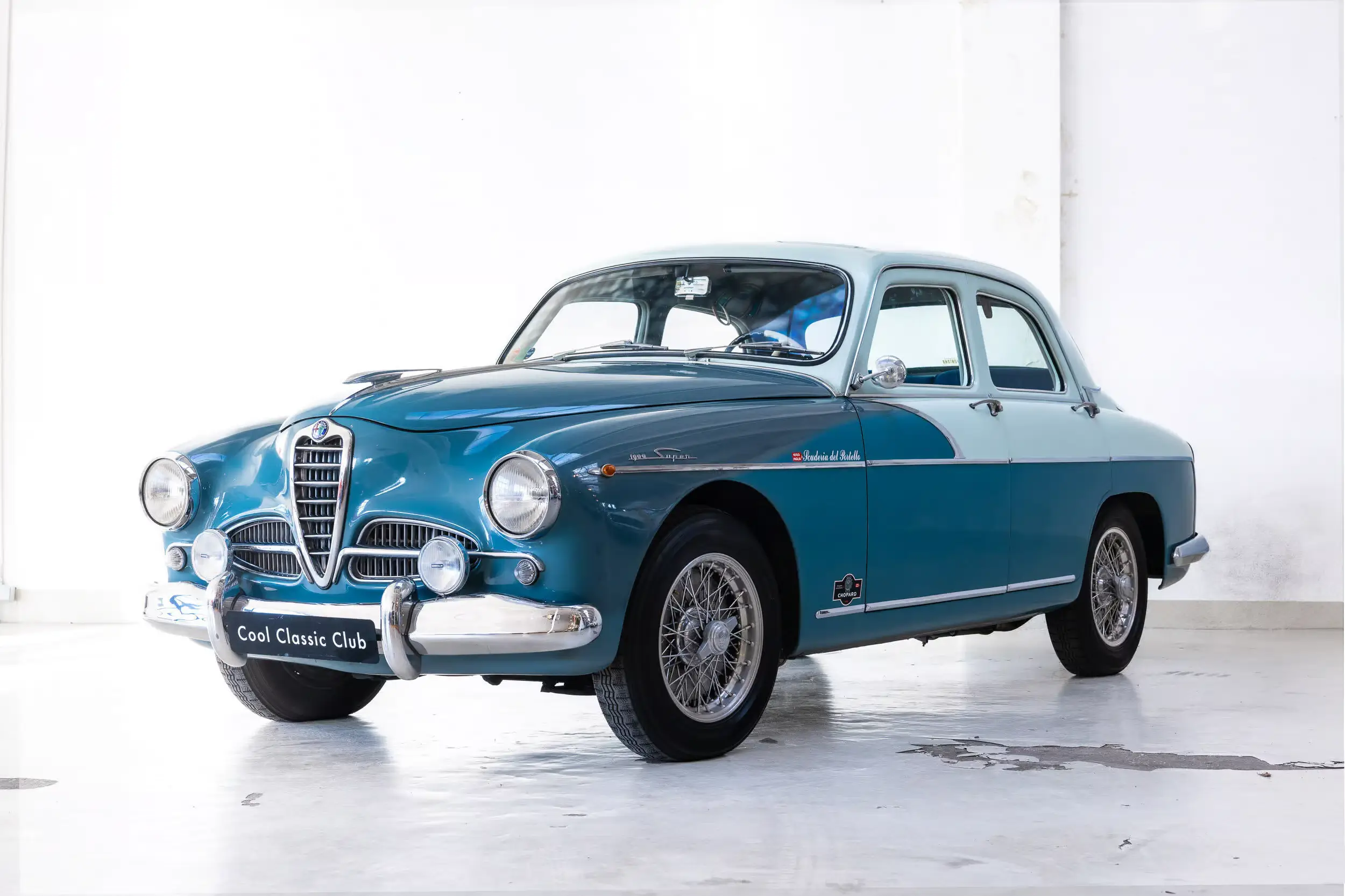 Front oblique view of the 1956 Celeste Avio  Alfa Romeo 1900 Super Bicolore
