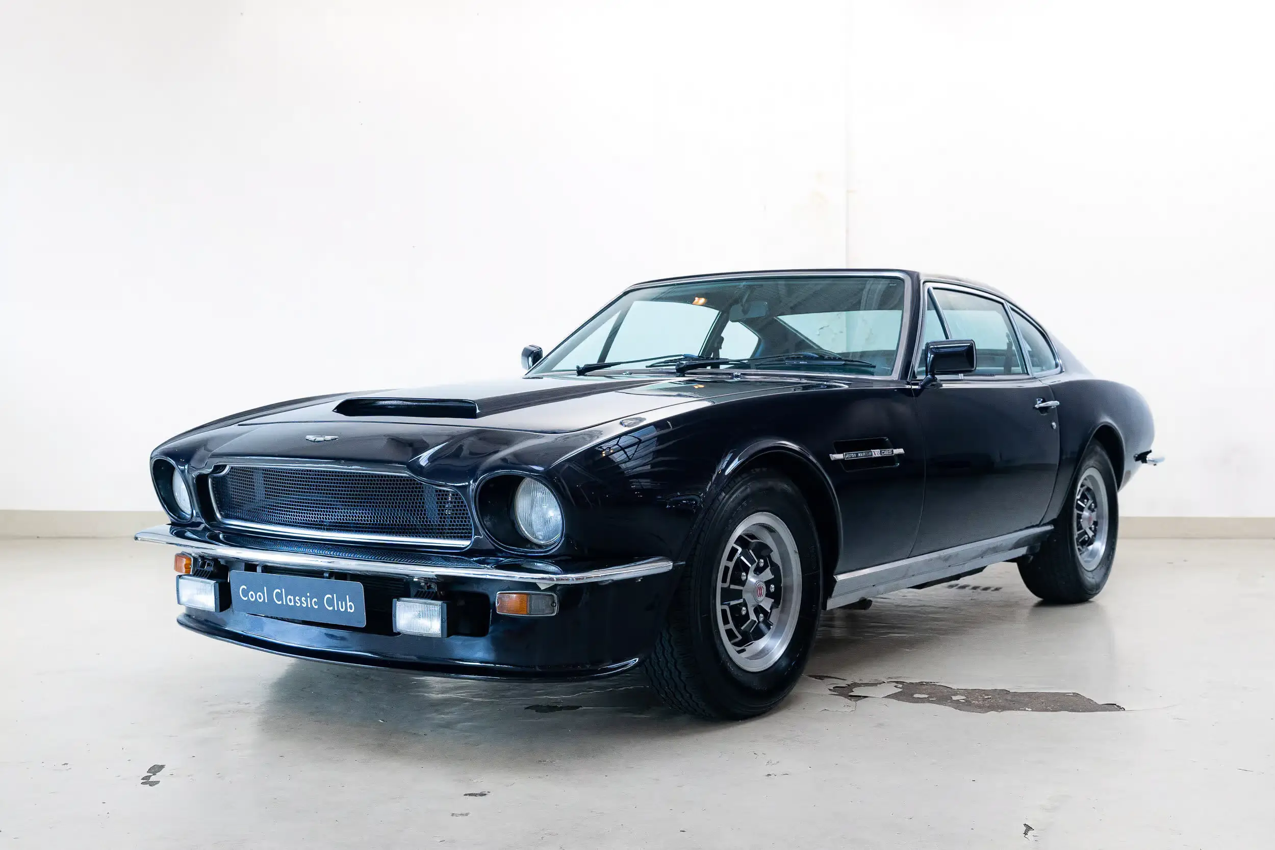 Front oblique view of the 1972 Blue Purple Aston Martin DBS V8 Series 2