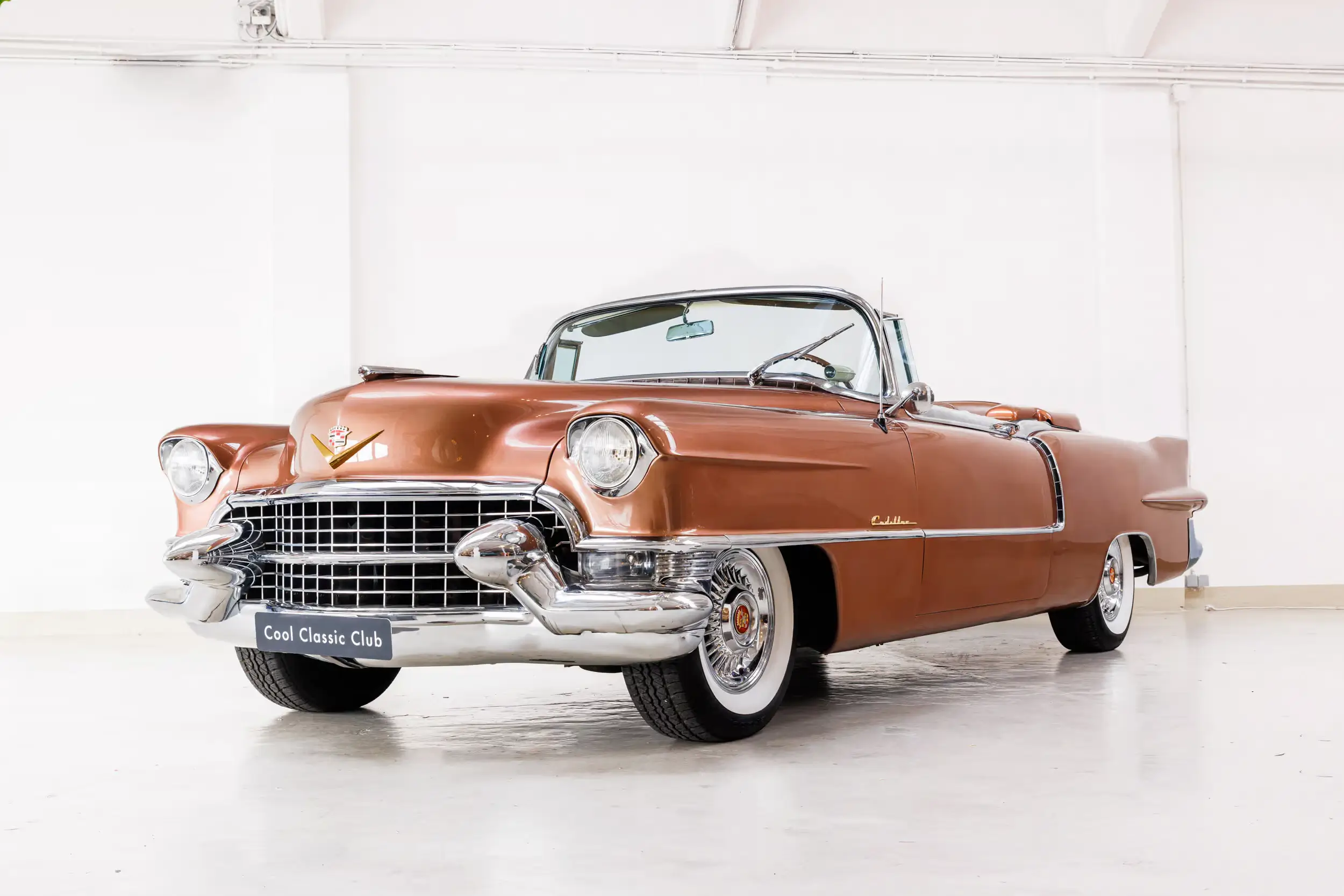 Front oblique view of the 1955 Copper Poly Cadillac Eldorado Series 62 Convertible