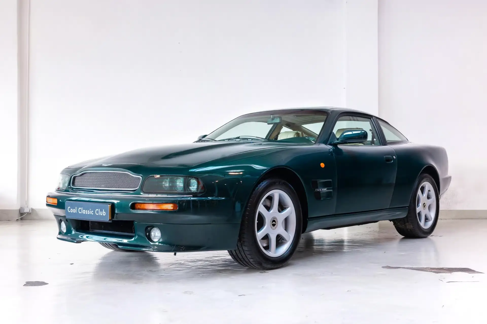 Front oblique view of the 1999 Grampian Green Aston Martin V8 Coupé
