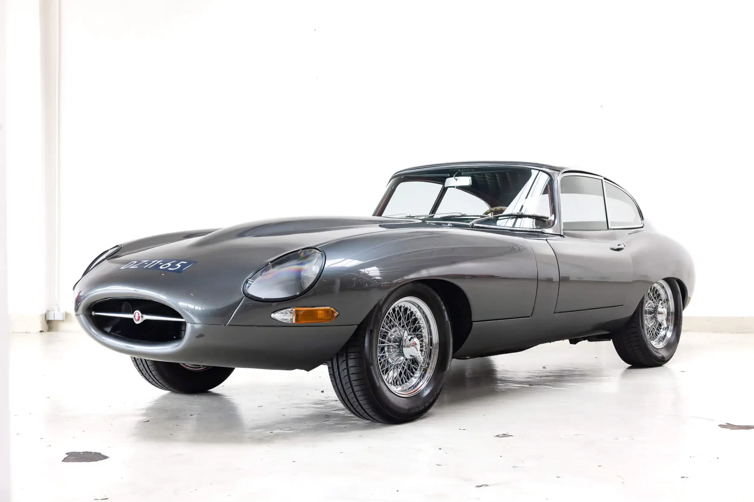 Front oblique view of the 1963 Gunmetal grey  Jaguar E-type Series 1 3.8 FHC