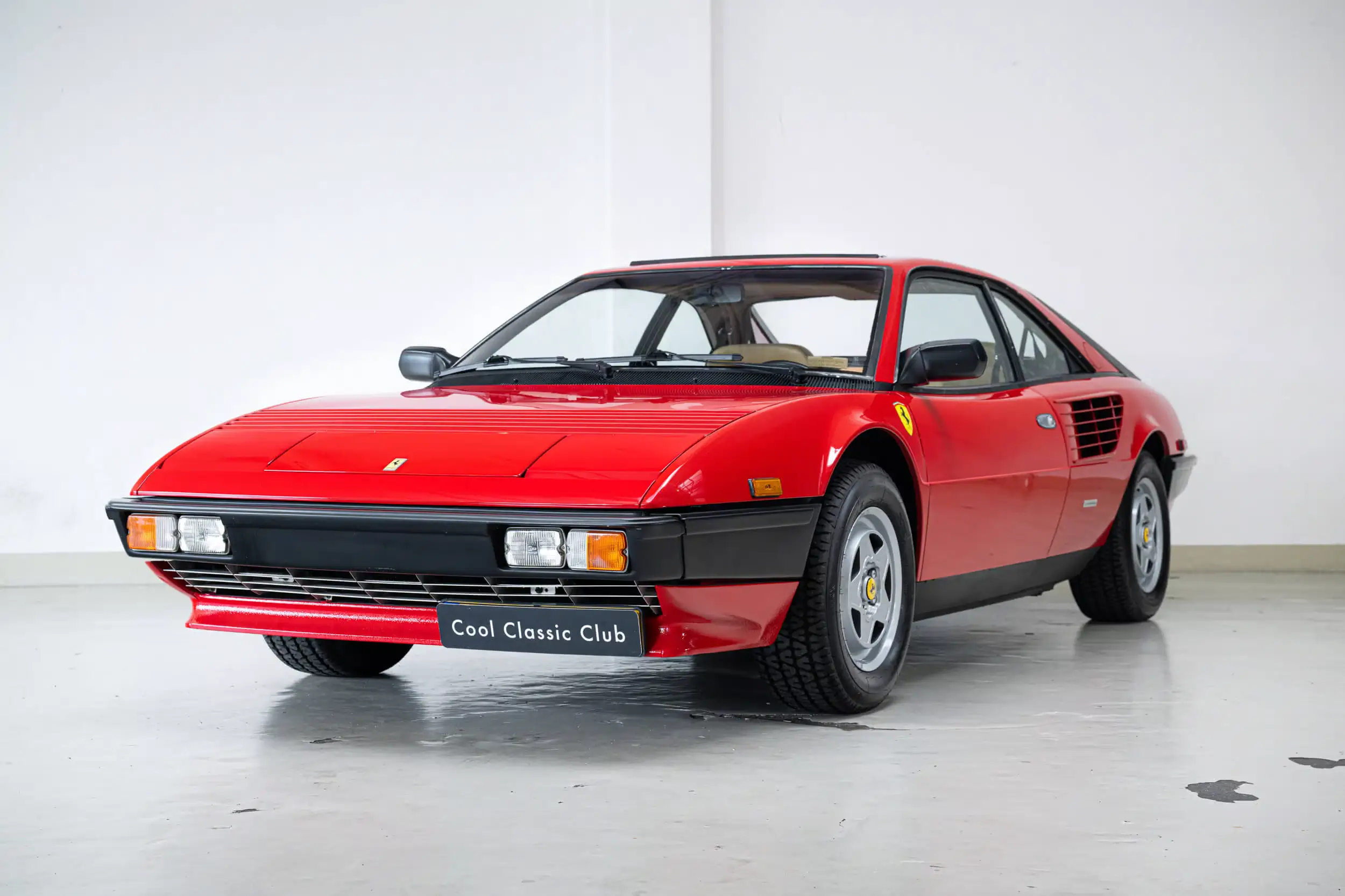 Front oblique view of the 1985 Rosso Corsa Ferrari Mondial Quattrovalvole