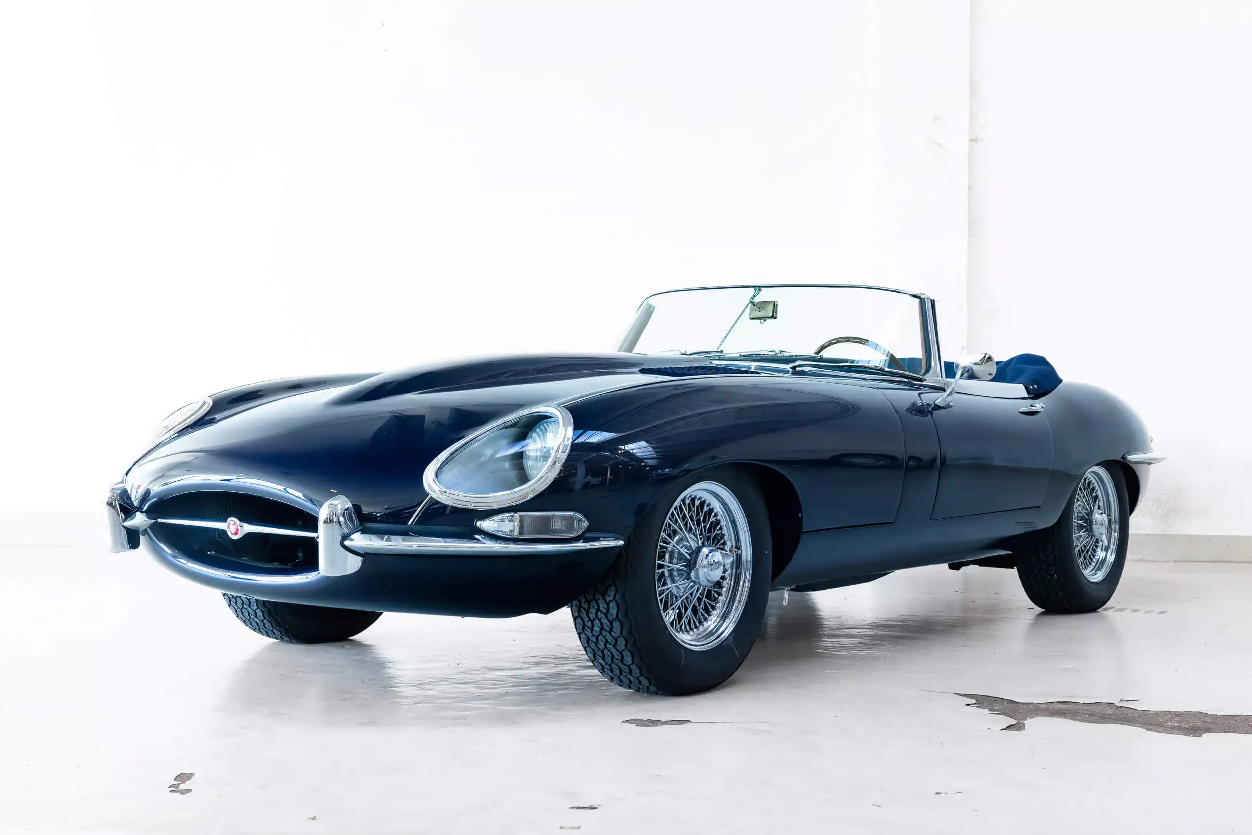 Front oblique view of the 1967 Dark Blue Jaguar E-Type Series 1 OTS