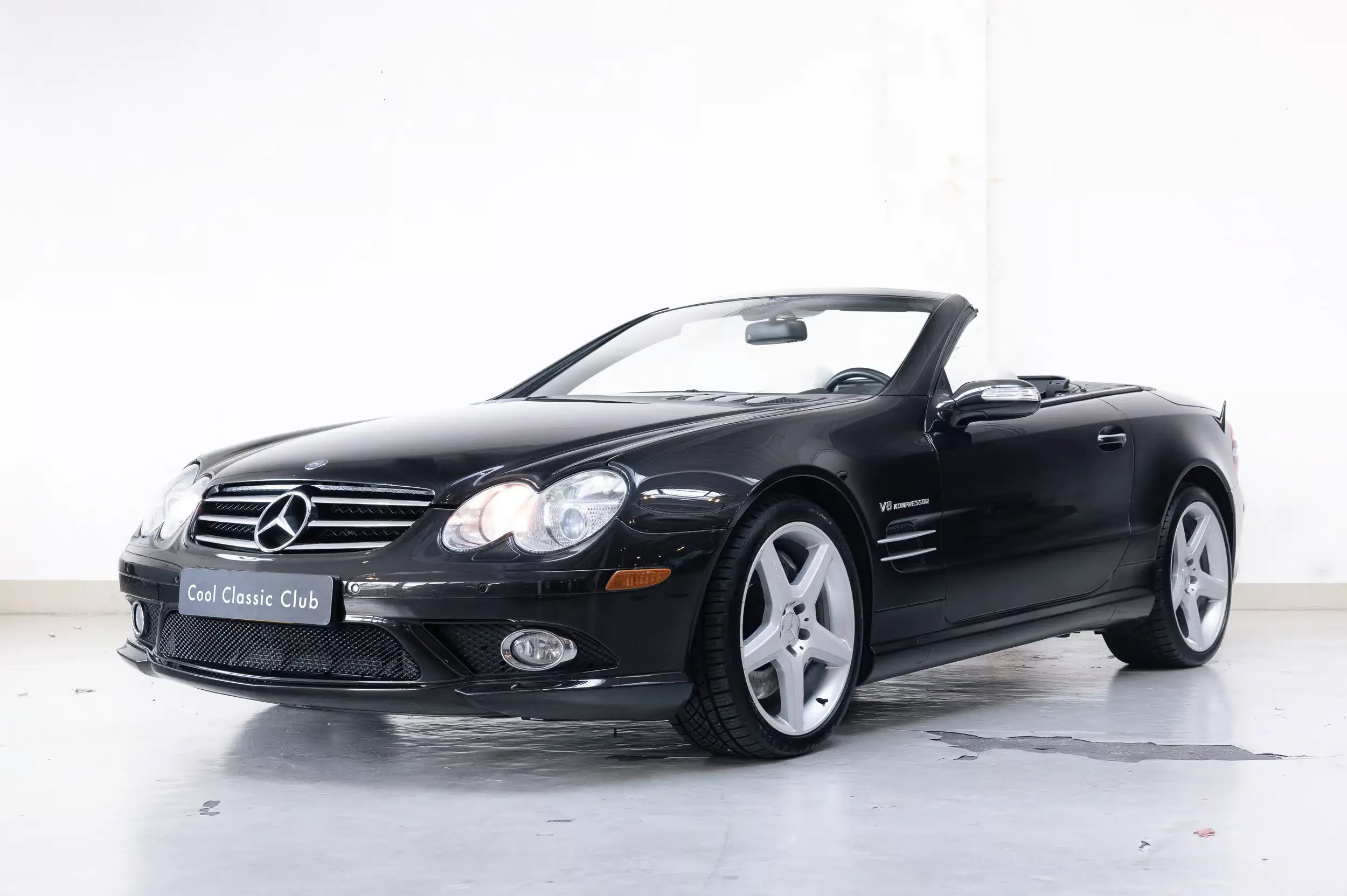 Front oblique view of the 2007 Designo Mocca Black Mercedes-Benz SL 55 AMG