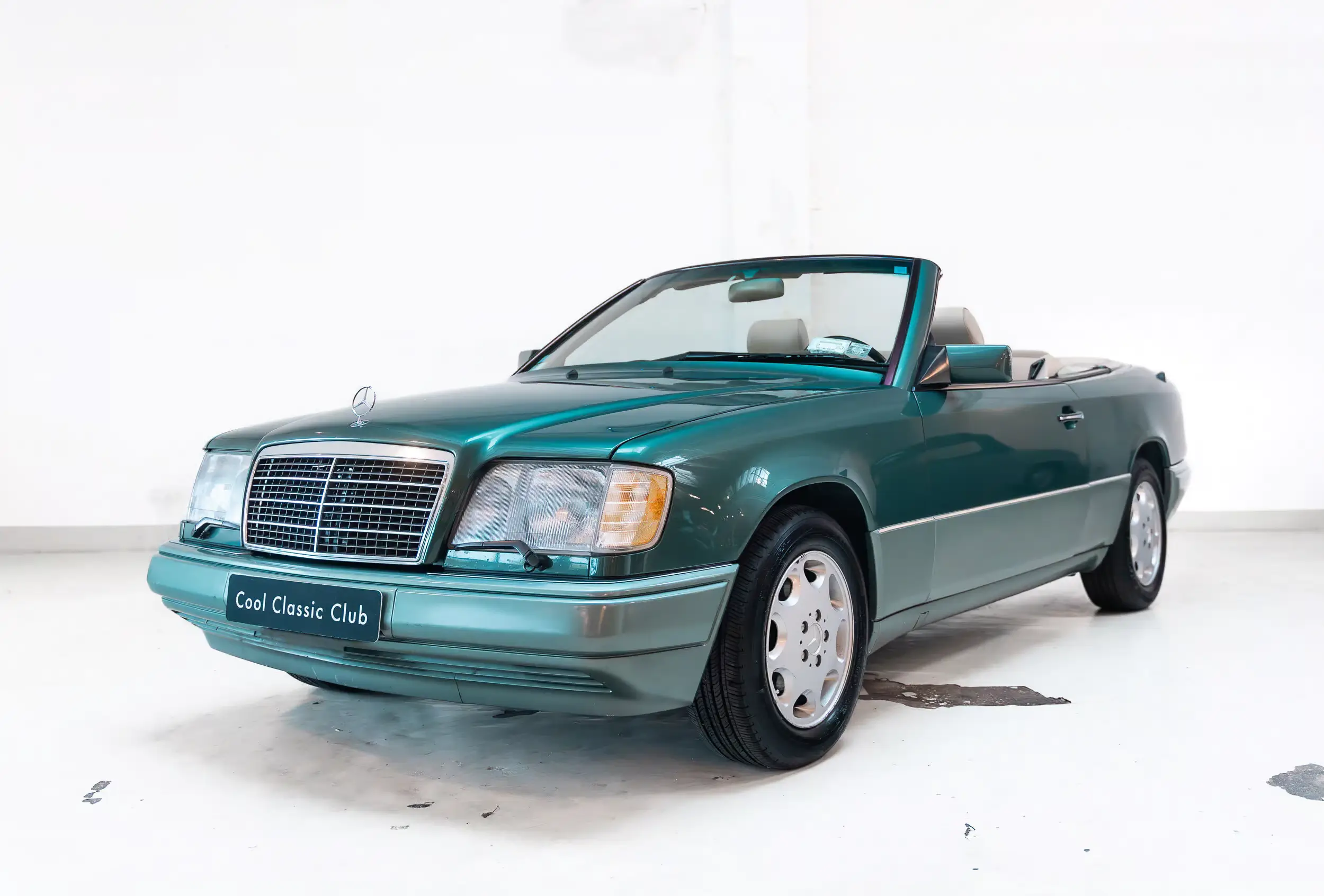 Front oblique view of the 1994 Spruce Green Mercedes-Benz E320 Cabriolet