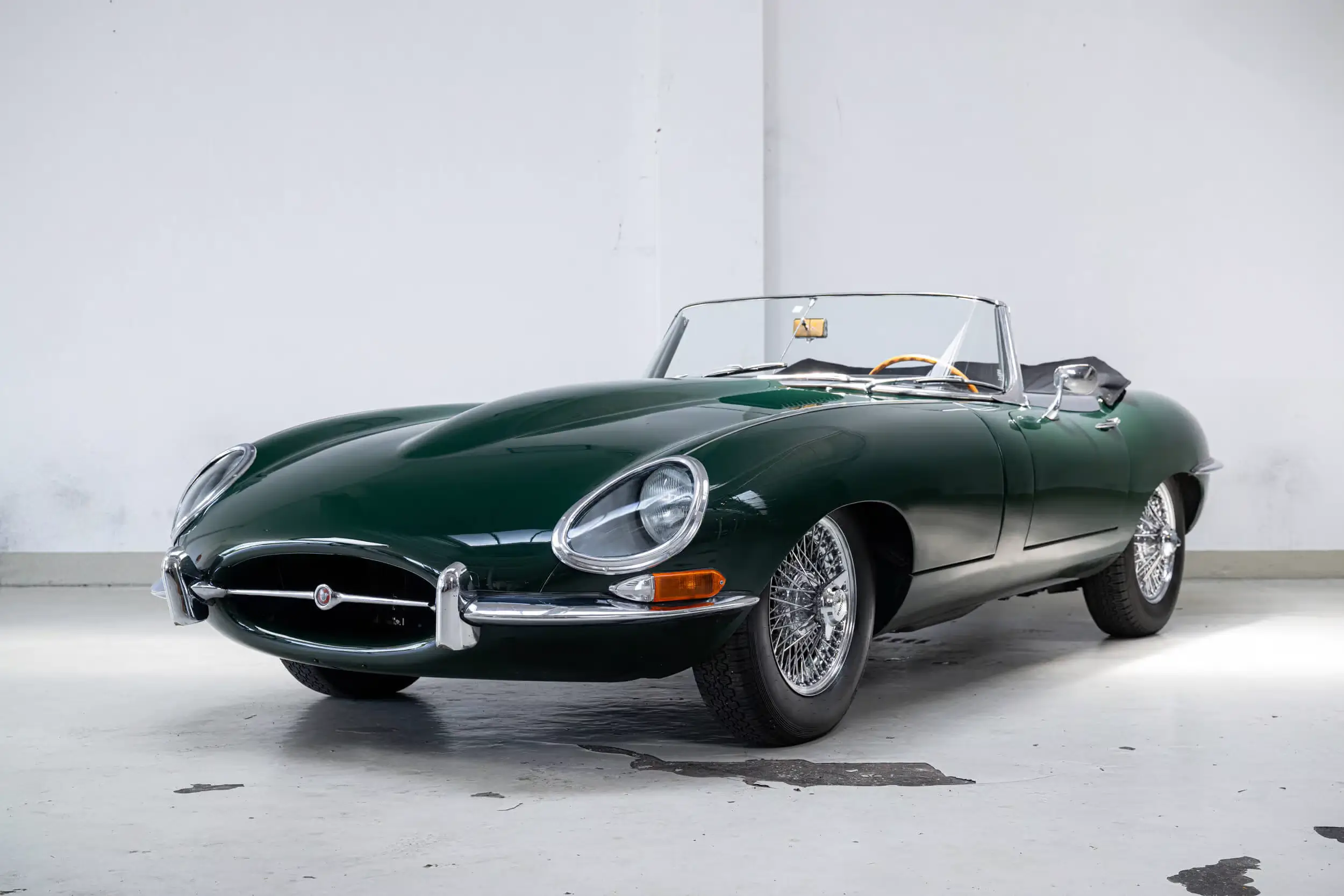 Front oblique view of the 1963 British Racing Green Jaguar E-Type series 1 OTS