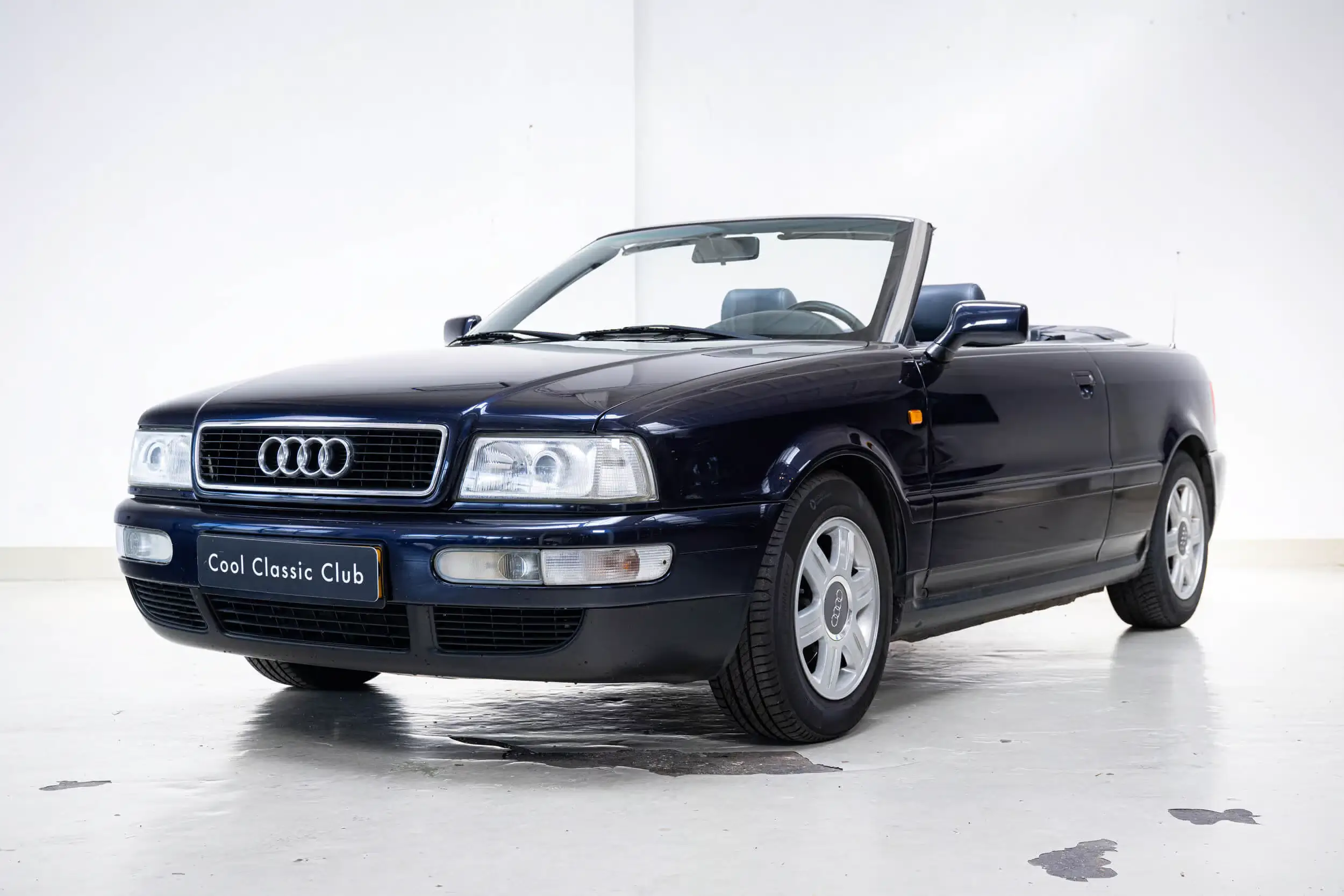 Front oblique view of the 1998 Blue metallic Audi Cabriolet 1.8 