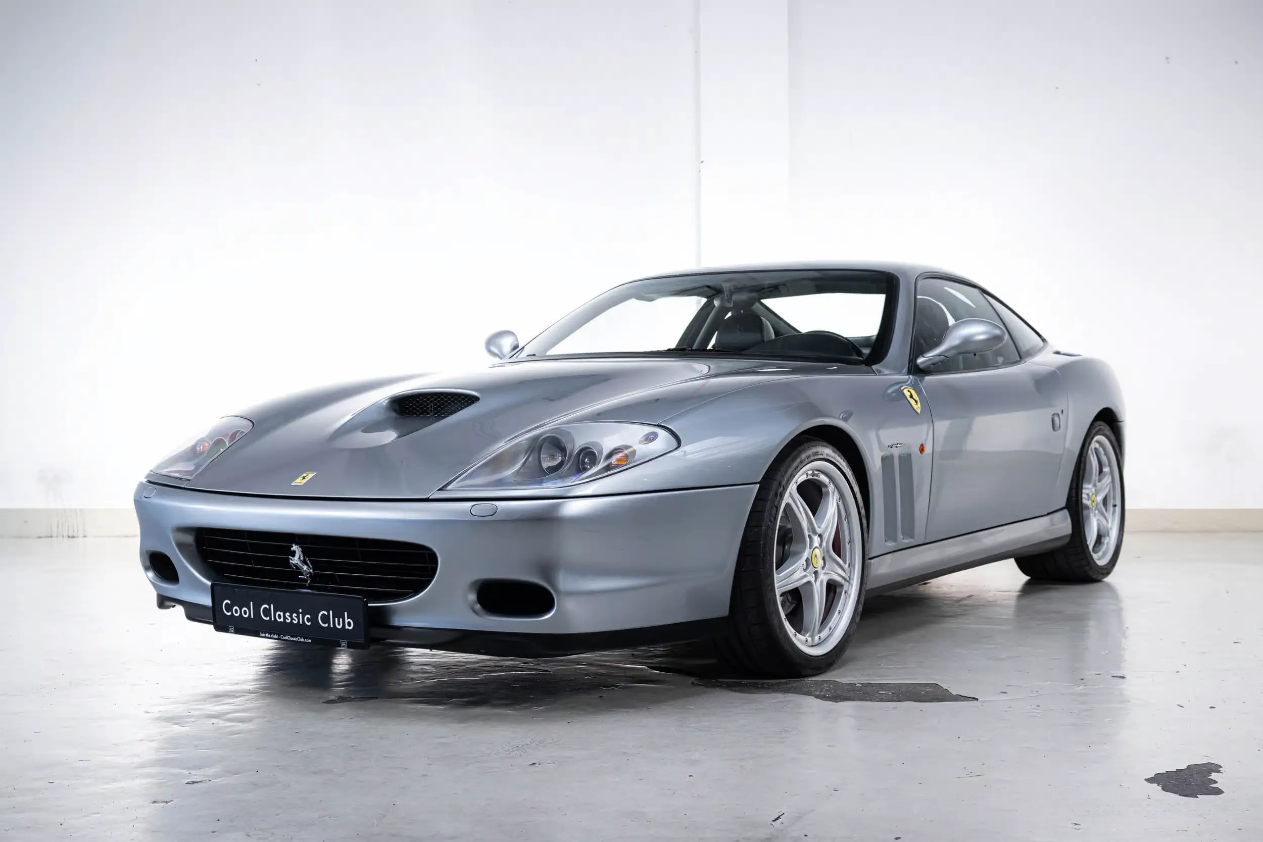 Front oblique view of the 2003 Grigio Titano  Ferrari 575M Maranello 