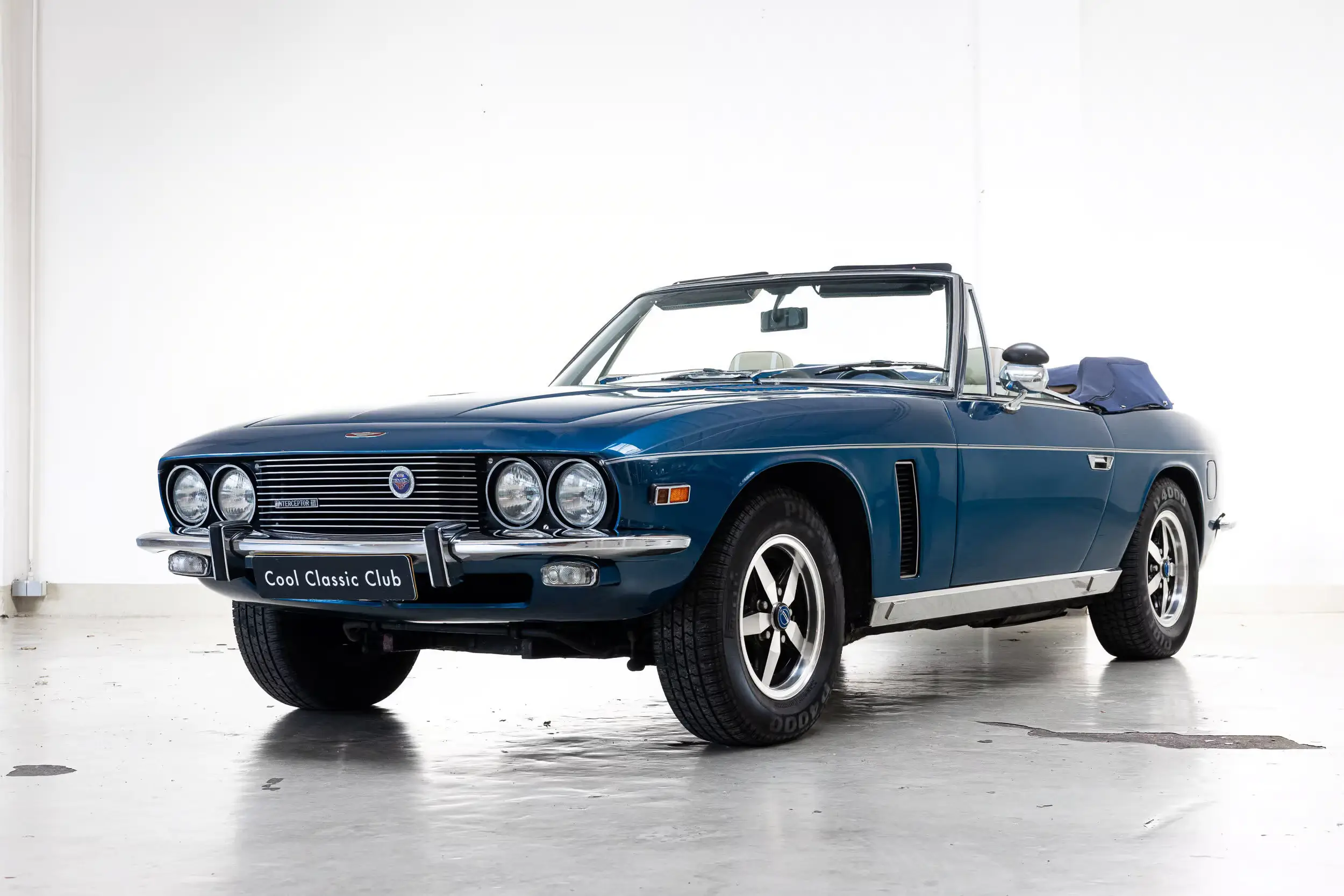 Front oblique view of the 1975 Nevis Blue metallic Jensen Interceptor MKIII Cabriolet