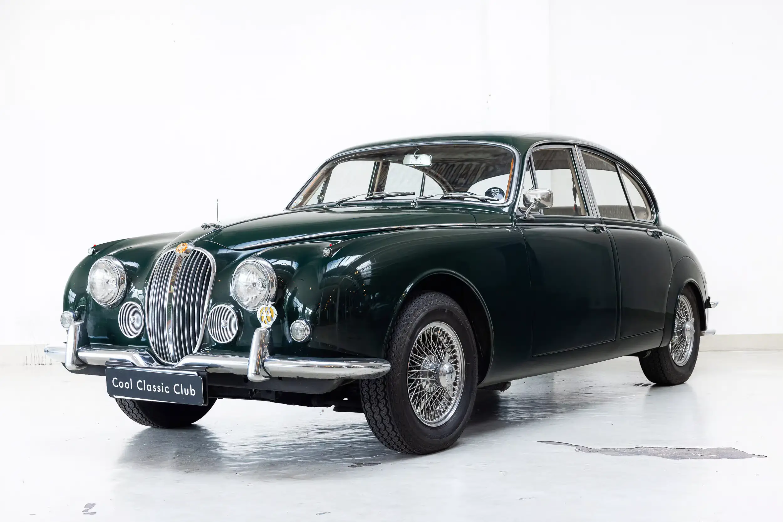 Front oblique view of the 1969 British Racing Green Jaguar MKII 