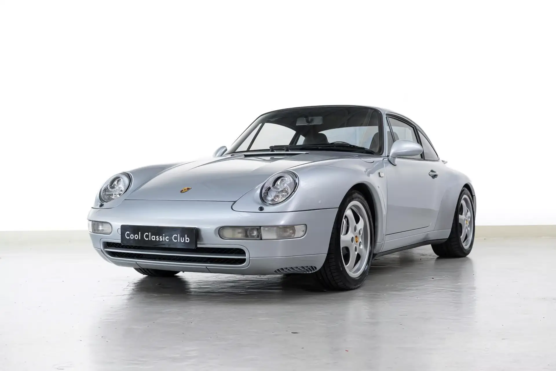 Front oblique view of the 1996 Polar Silber Porsche 993 Carrera 4
