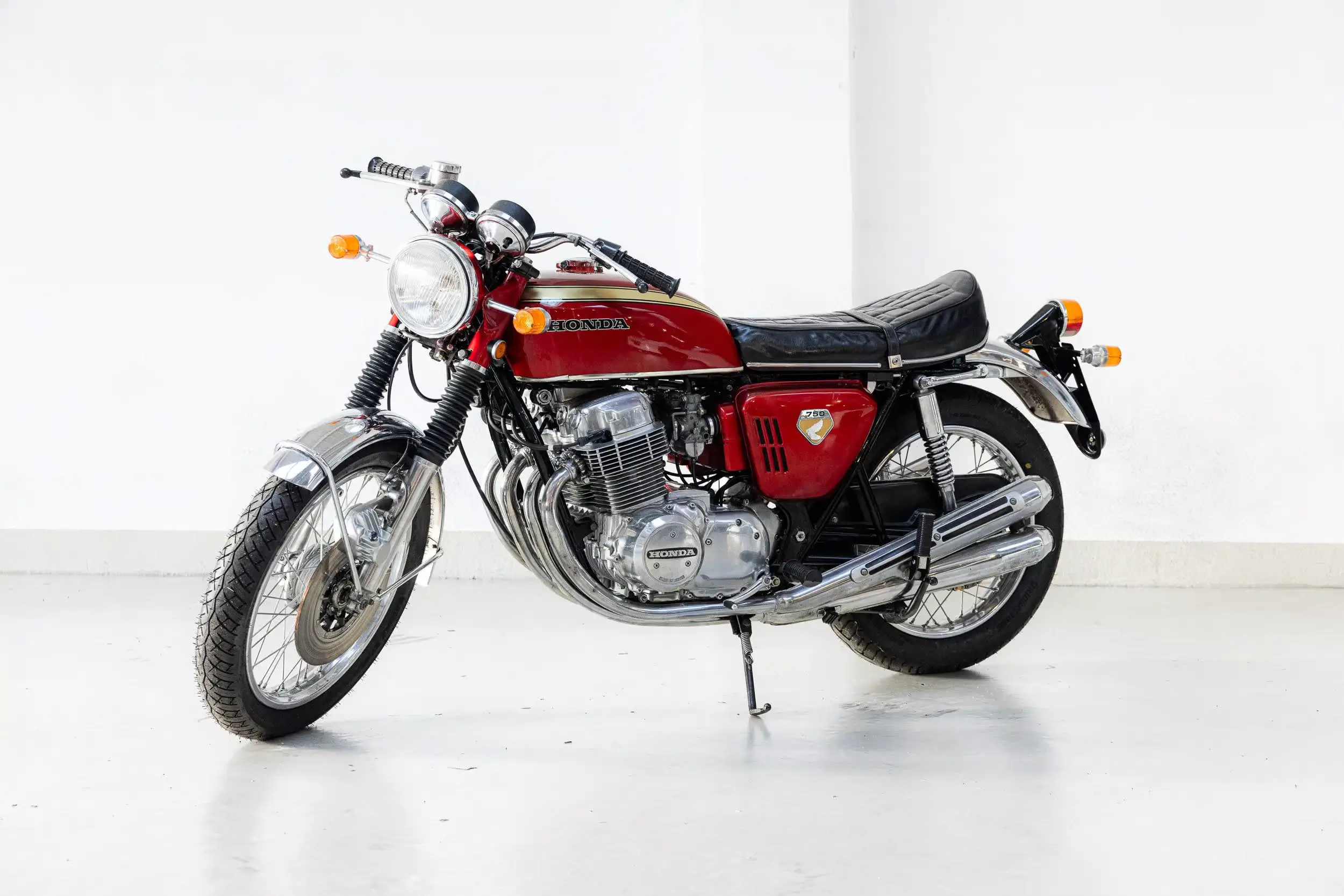 Front oblique view of the 1969 Candy Ruby Red Honda CB750 Sandcast
