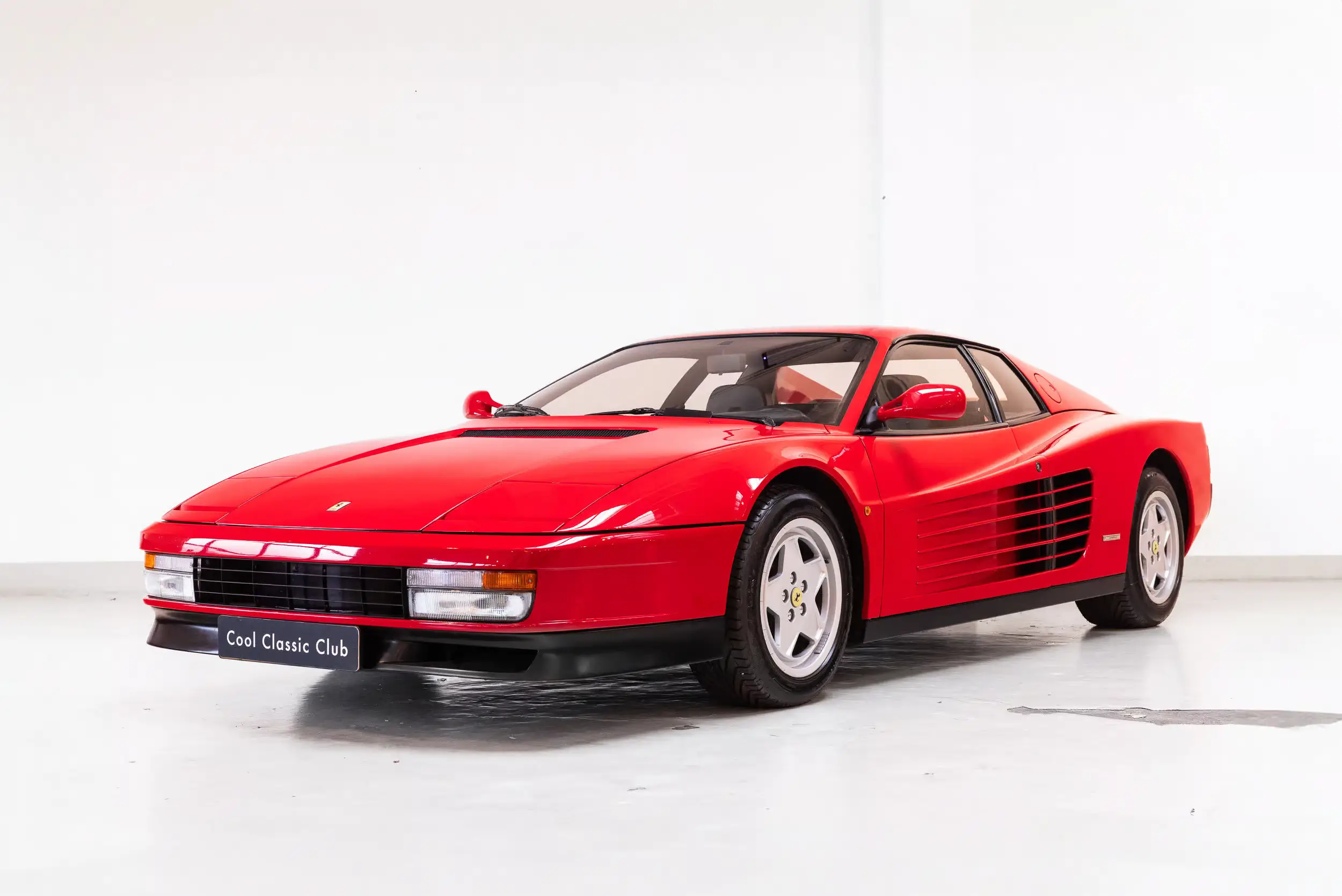 Front oblique view of the 1988 Rosso Corsa Ferrari Testarossa