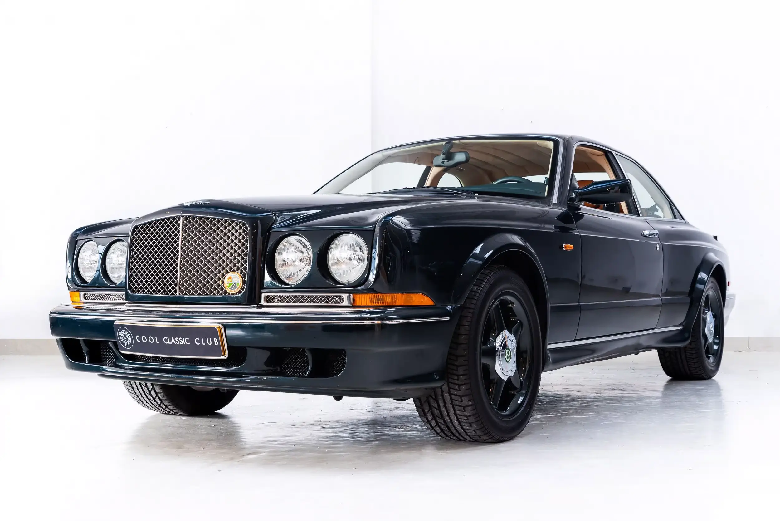 Front oblique view of the 2003 Black Emerald Bentley Continental R Mulliner Widebody