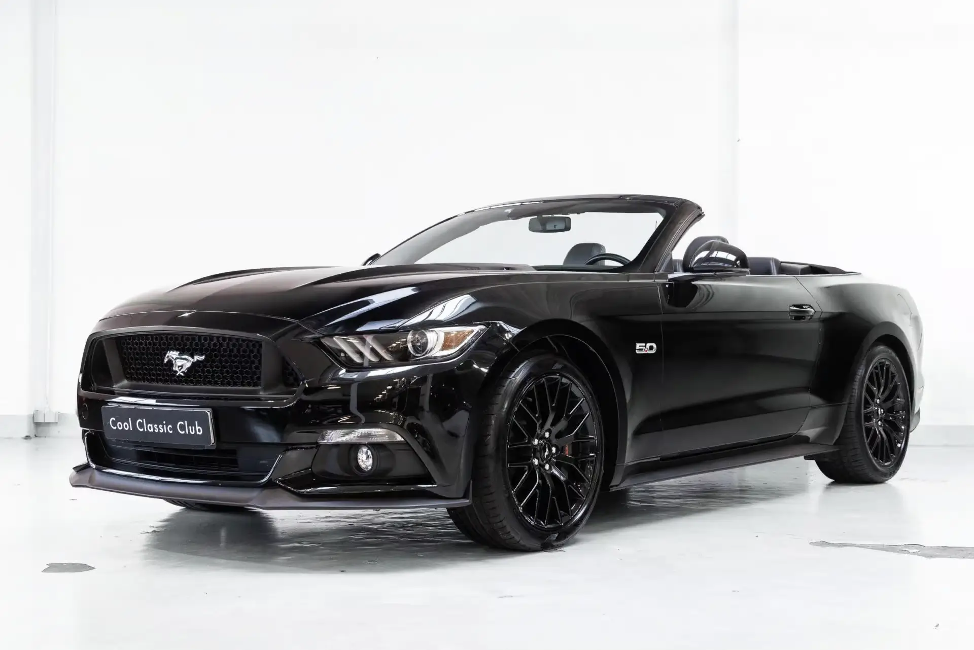 Front oblique view of the 2017 Black Ford Mustang Convertible 5.0 GT 