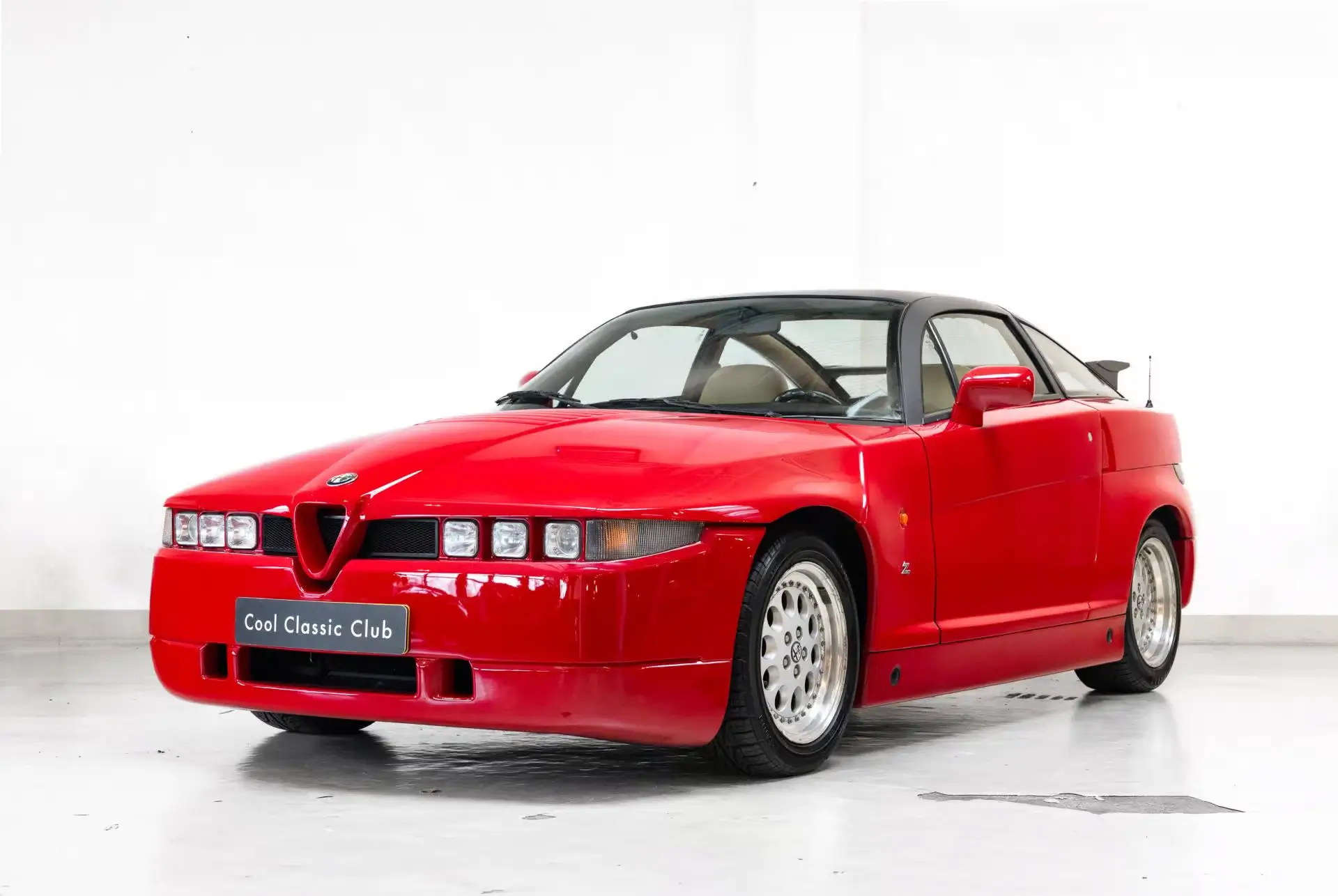 Front oblique view of the 1990 Red Alfa Romeo SZ 3.0 Coupé
