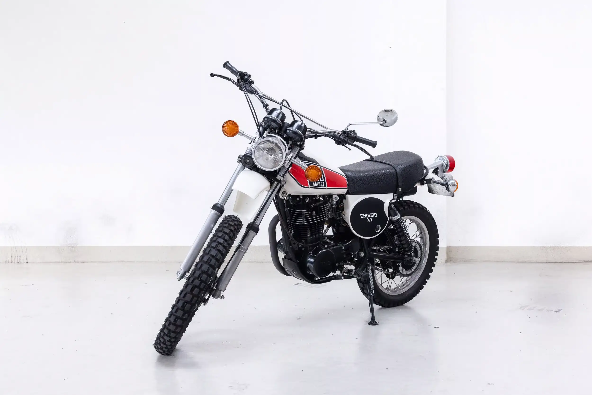 Front oblique view of the 1976 White Yamaha XT 500 Enduro