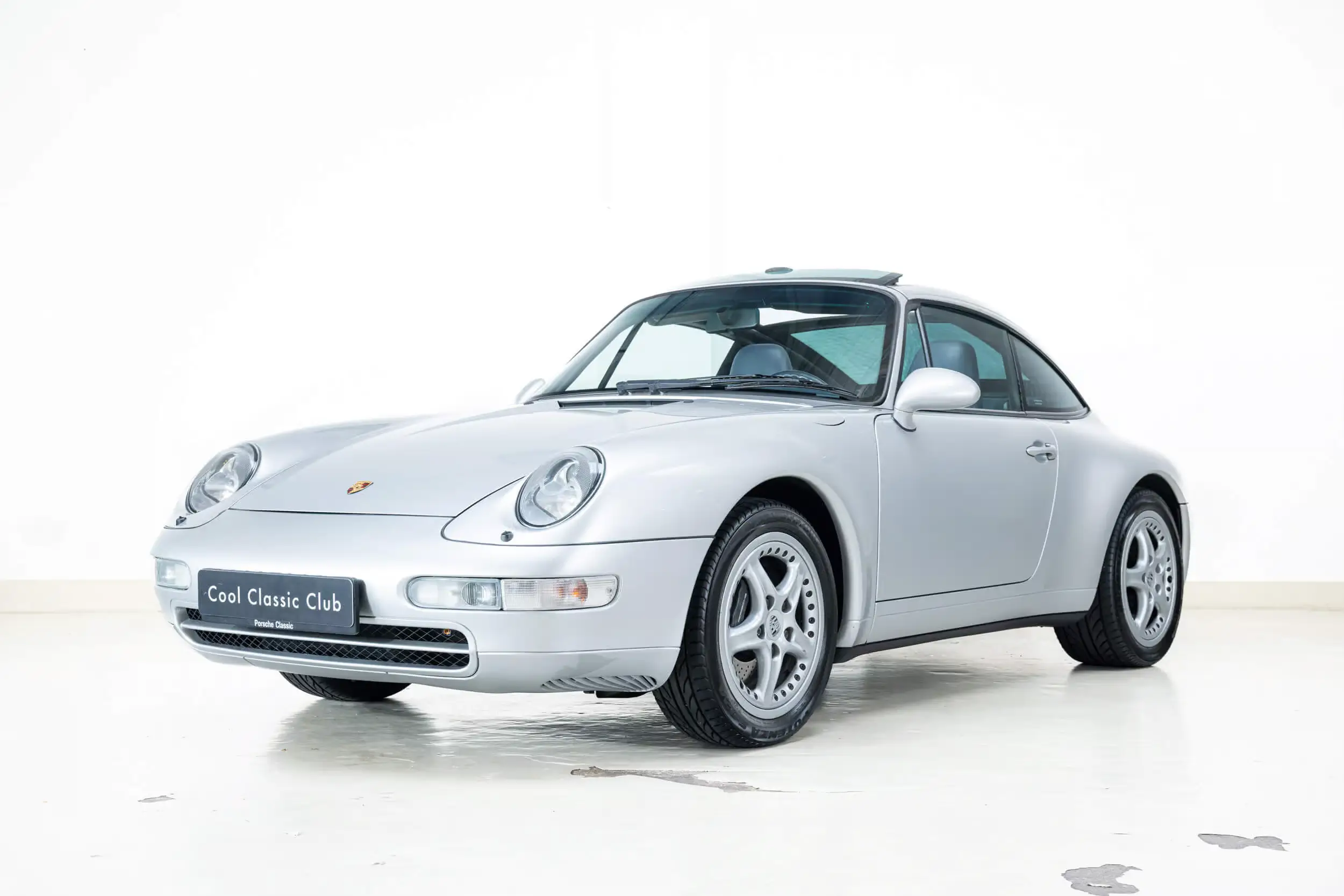 Front oblique view of the 1996 Artic Silver Metallic Porsche 993 Targa 
