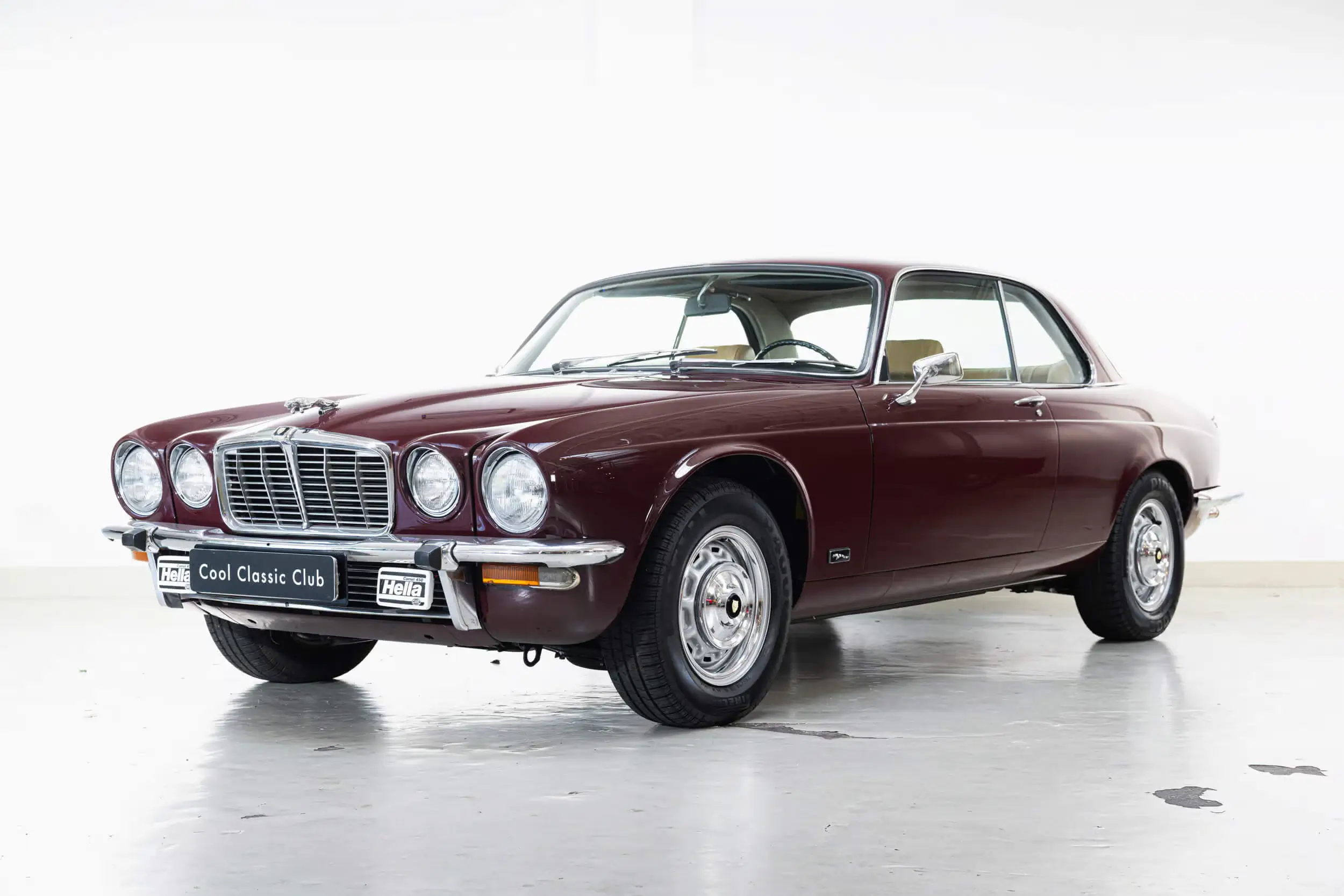 Front oblique view of the 1976 Regency Red Jaguar XJ 4.2C