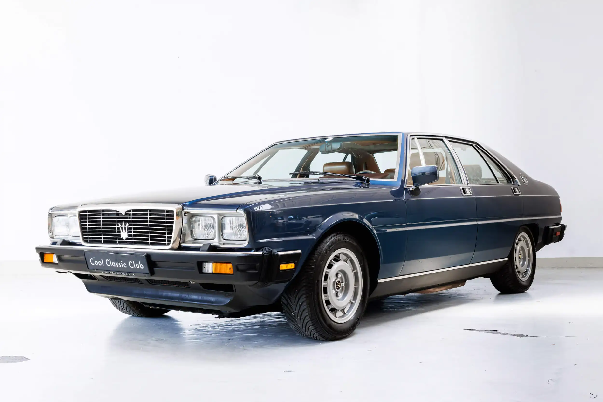 Front oblique view of the 1982 Dark Aqua Maserati Quattroporte 4.9