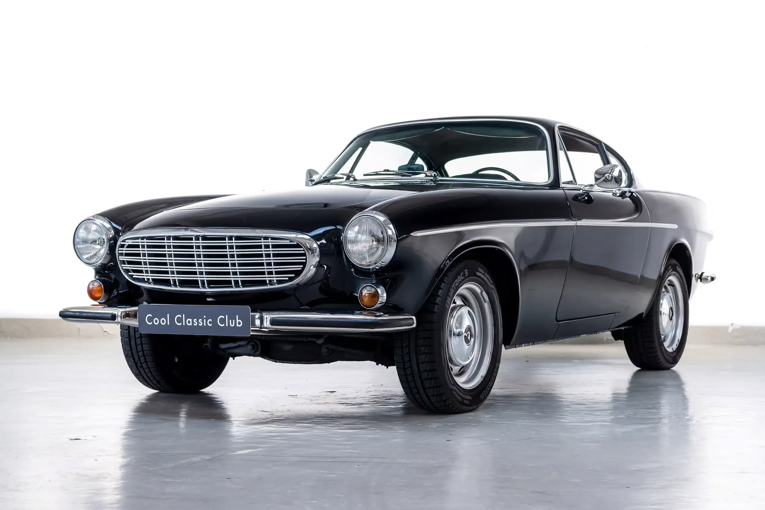 Front oblique view of the 1968 Black Volvo P1800 S