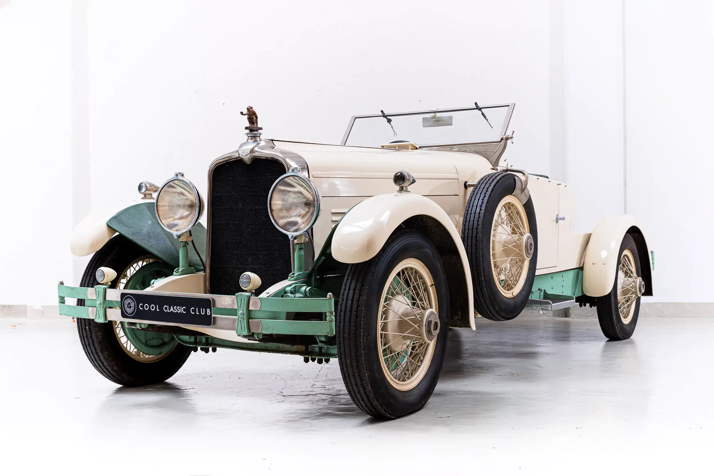 Front oblique view of the 1929 White and green Stutz Black Hawk Speedster
