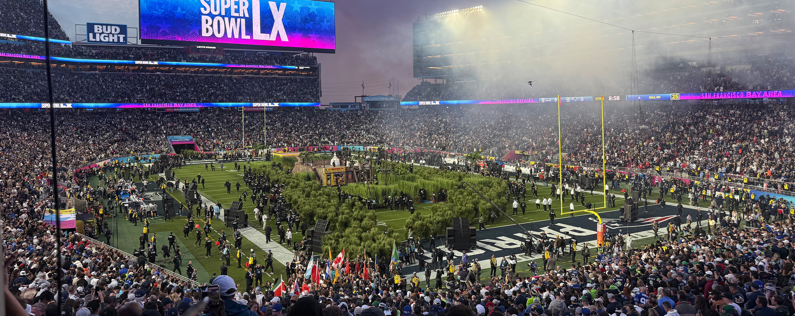 A wide shot of Bad Bunny performing at the Super Bowl LX Halftime show