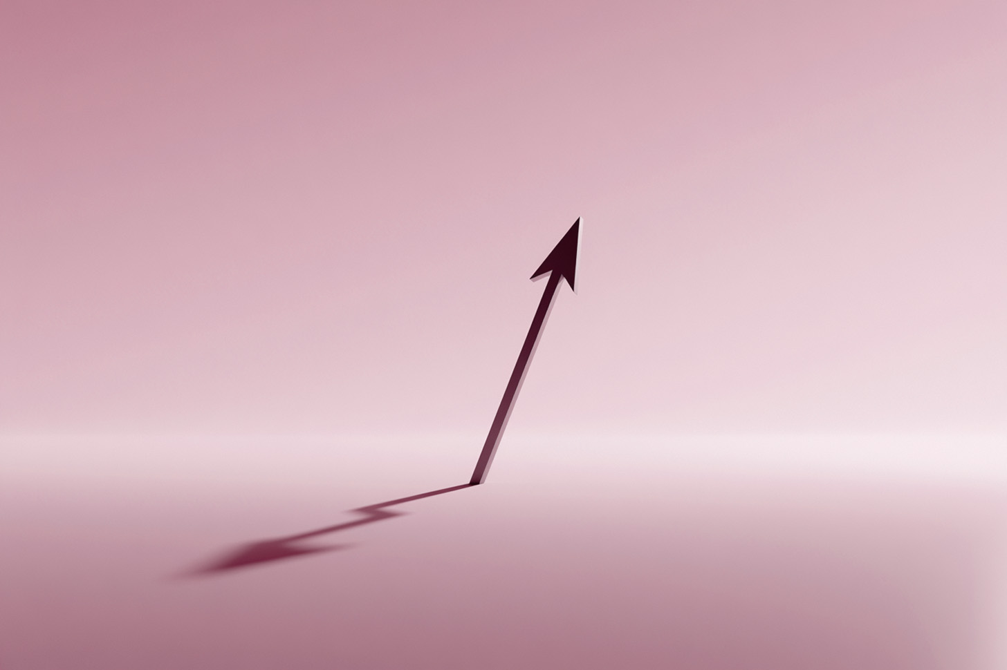 An upward arrow whose shadow falls in a jagged shape, symbolizing strengths turning into risks under pressure.