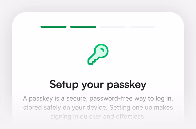 Screen with a green key icon and message “Setup your passkey,” explaining that a passkey is a secure, password-free way to log in stored safely on your device.