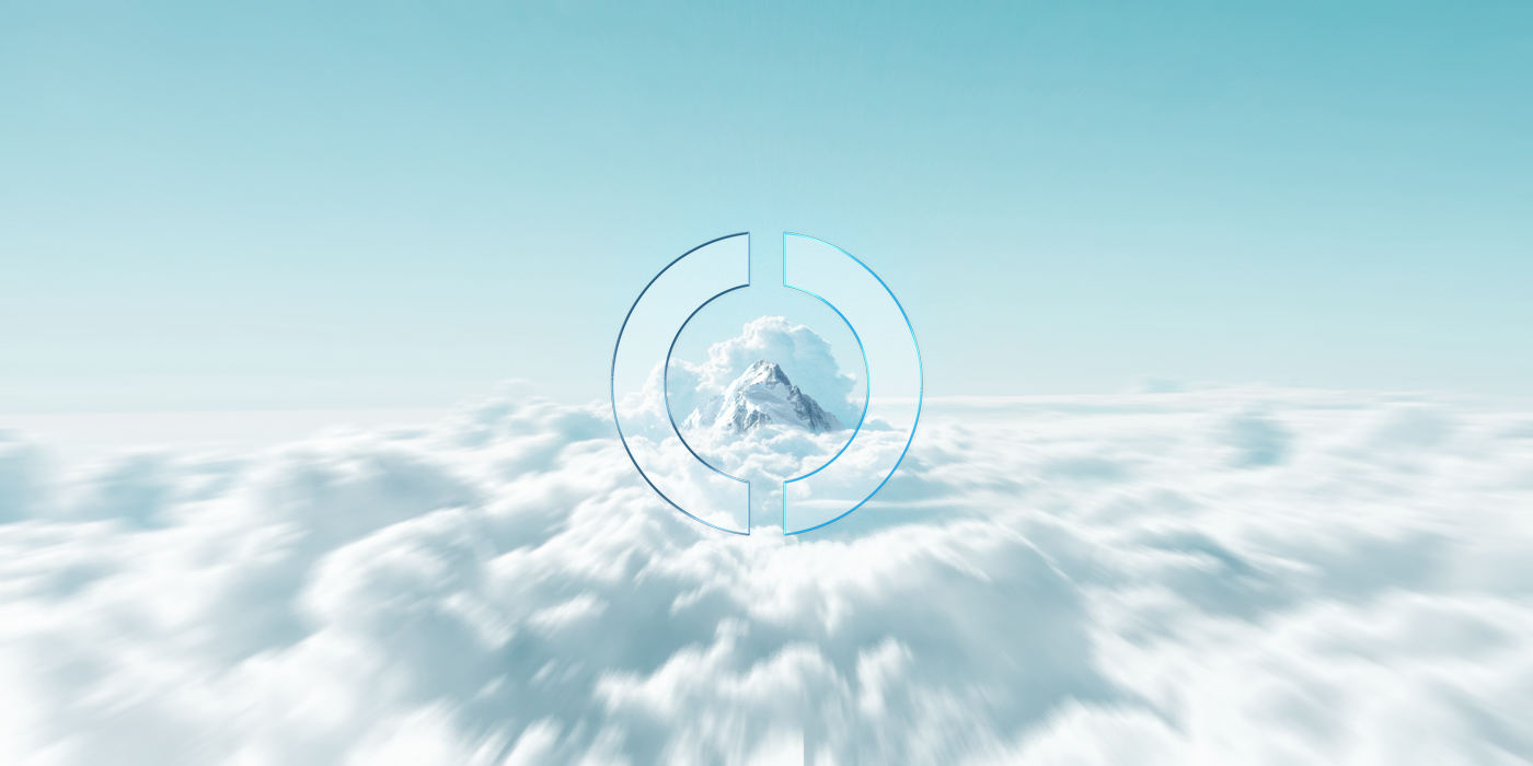 Über den Wolken ist am Horizont ein Berggipfel zu sehen. Der Gipfel wird durch das runde EMPORIAS Glaselement hervorgehoben.